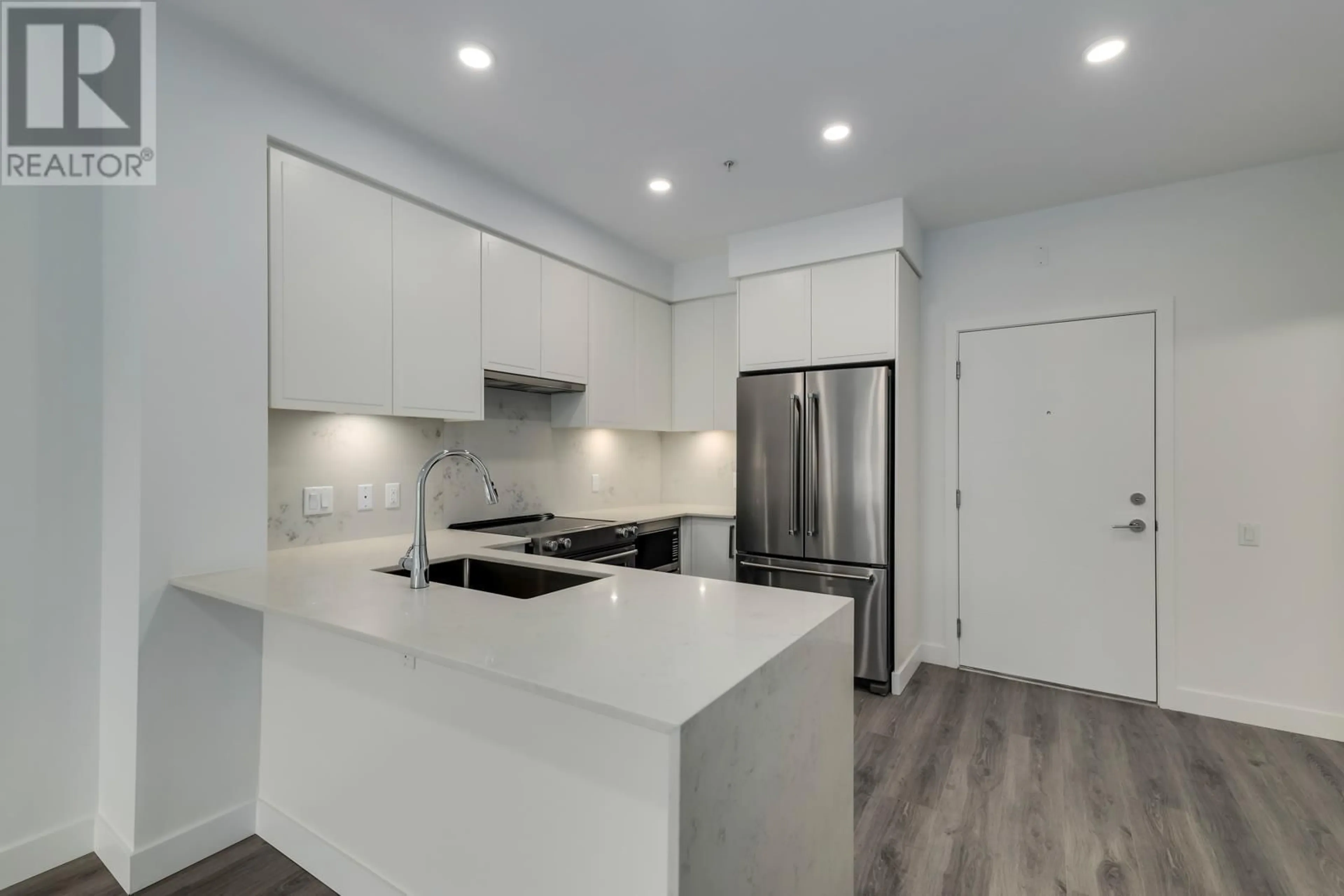 Open concept kitchen, unknown for 208 700 CLARKE ROAD, Coquitlam British Columbia V3J0K5