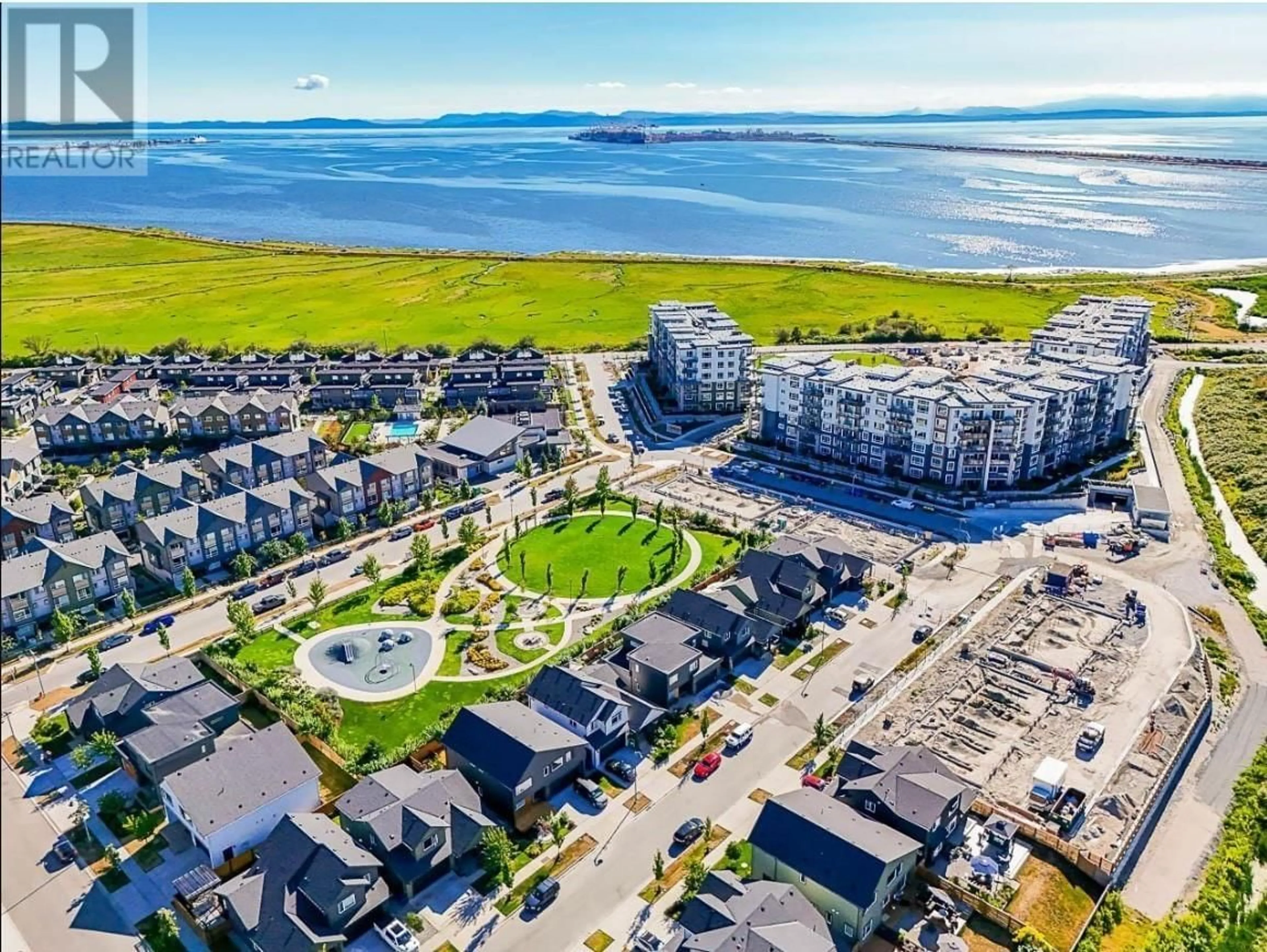 A pic from outside/outdoor area/front of a property/back of a property/a pic from drone, water/lake/river/ocean view for 603 - 2431 RABBIT DRIVE, Tsawwassen British Columbia V4M0G5