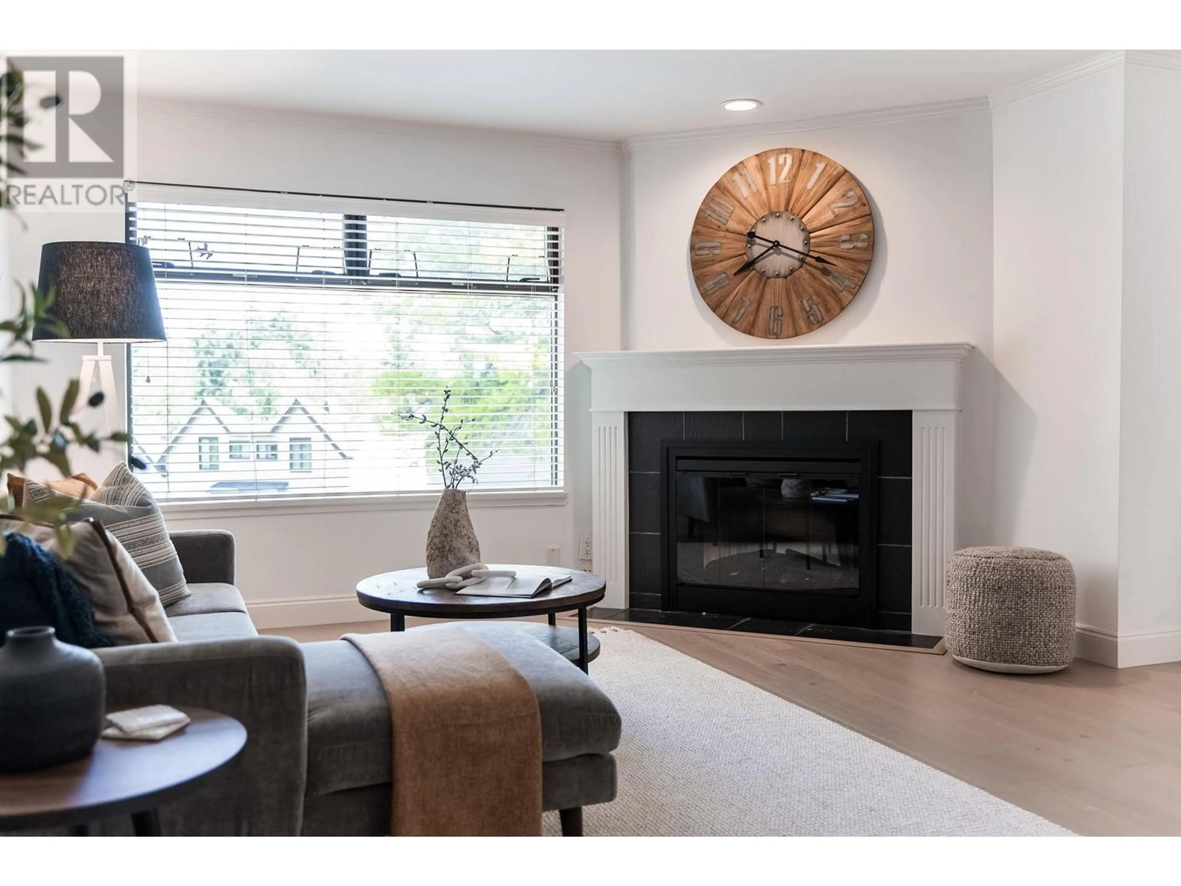 Living room with furniture, wood/laminate floor for 204 1005 W 7TH AVENUE, Vancouver British Columbia V6H1B2