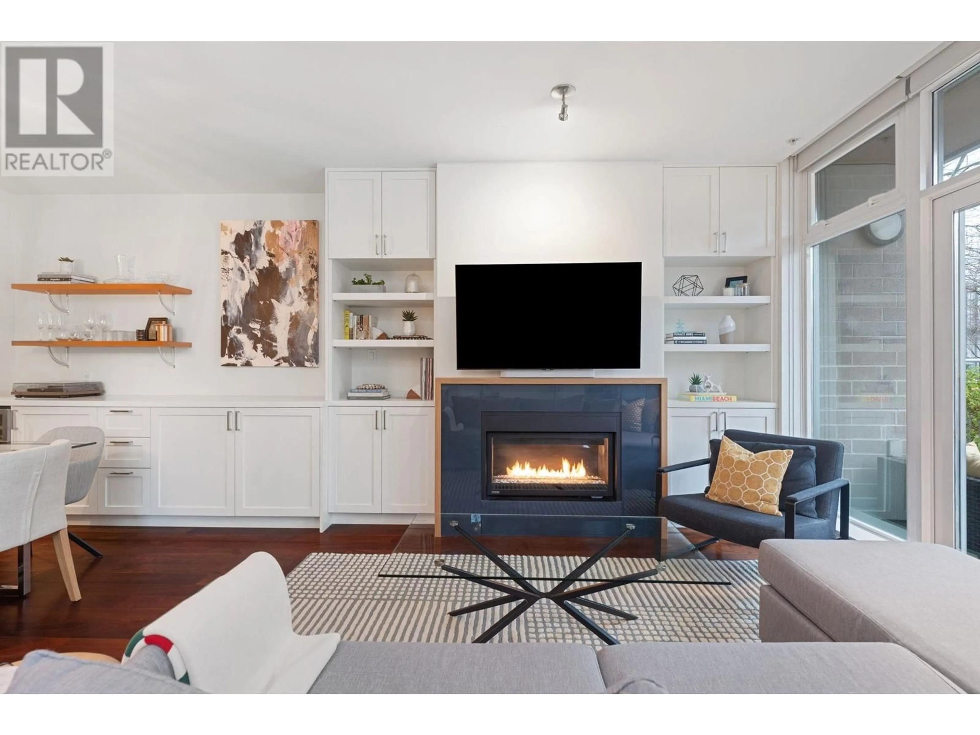 Living room with furniture, wood/laminate floor for 1689 W 8TH AVENUE, Vancouver British Columbia V6J1T8