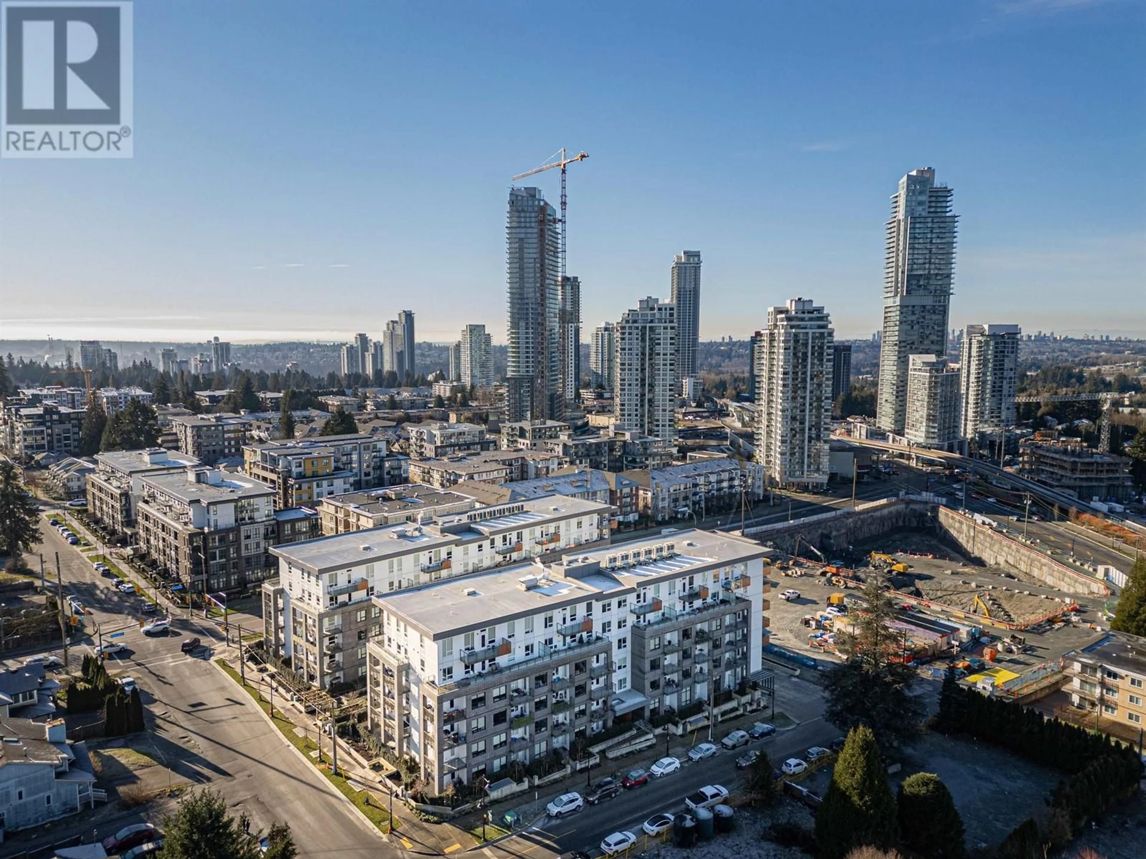 A pic from outside/outdoor area/front of a property/back of a property/a pic from drone, city buildings view from balcony for 217 645 COMO LAKE AVENUE, Coquitlam British Columbia V3J0N9