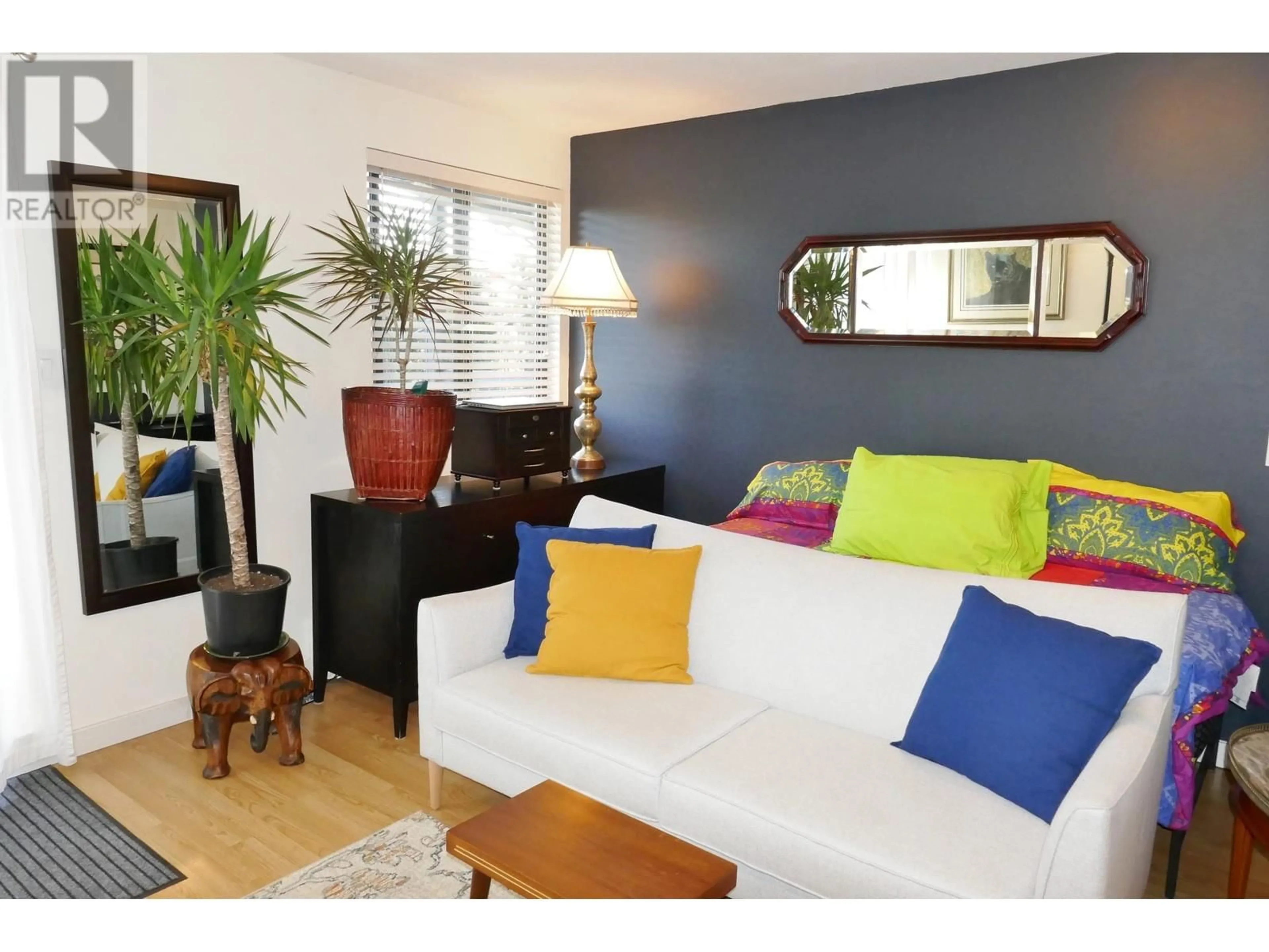 Living room with furniture, wood/laminate floor for 101 803 QUEENS AVENUE, New Westminster British Columbia V3M1L8