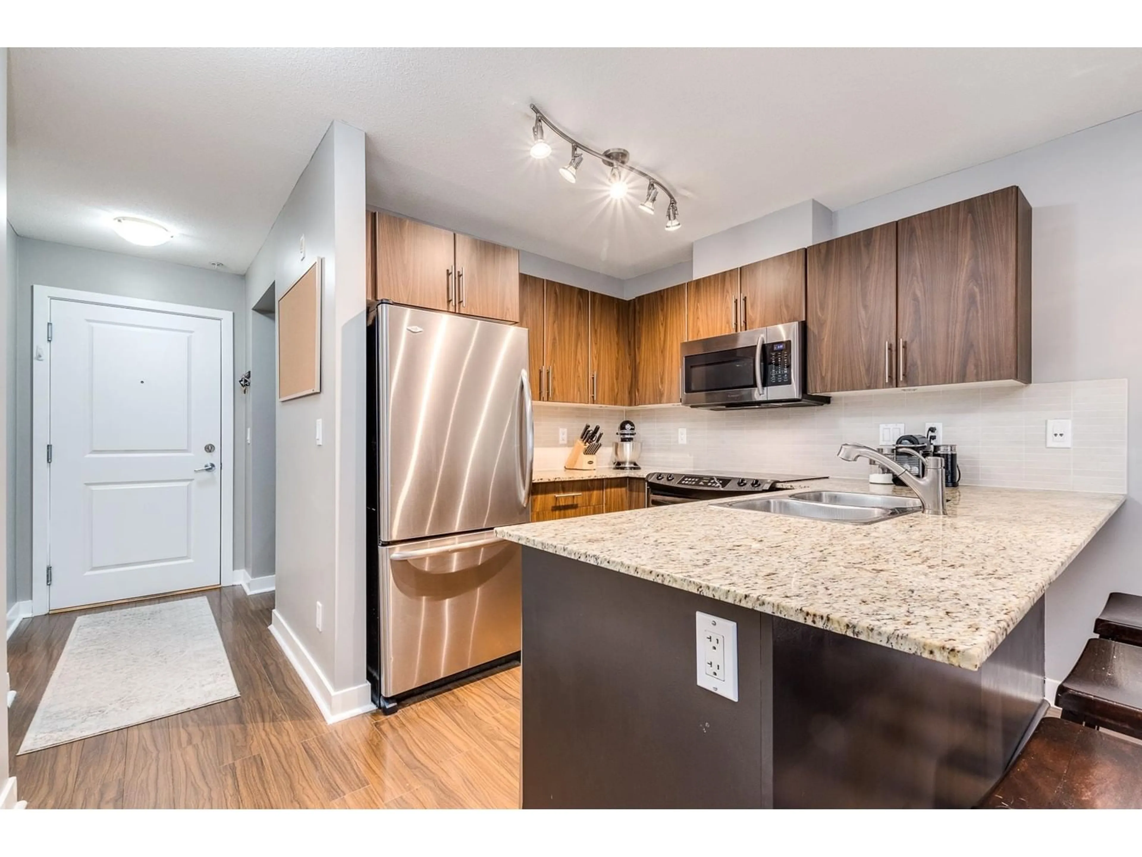 Standard kitchen, wood/laminate floor for C102 8929 202 STREET, Langley British Columbia V1M0B4