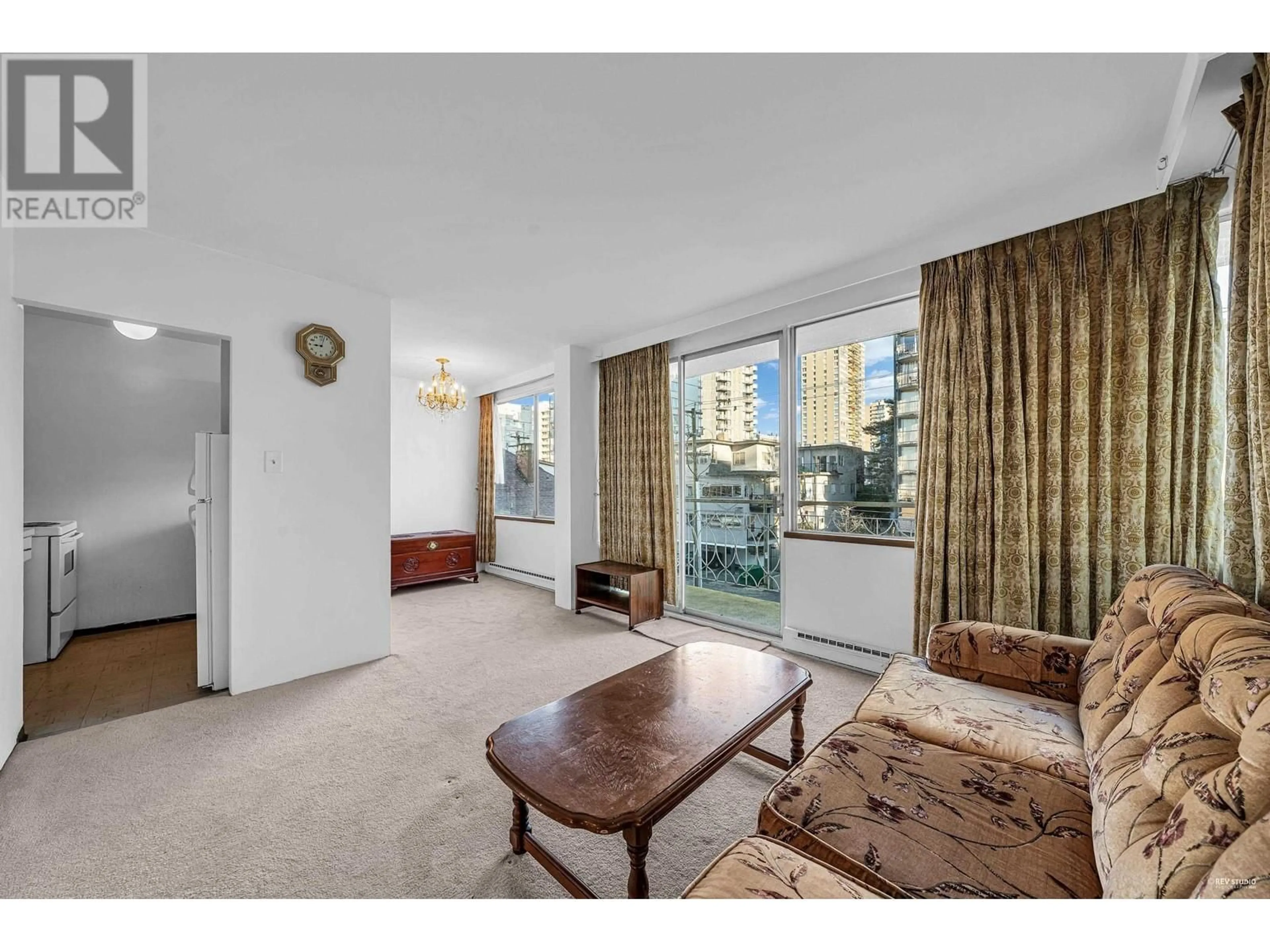 Living room with furniture, carpet floor for 501 1219 HARWOOD STREET, Vancouver British Columbia V6E1S5