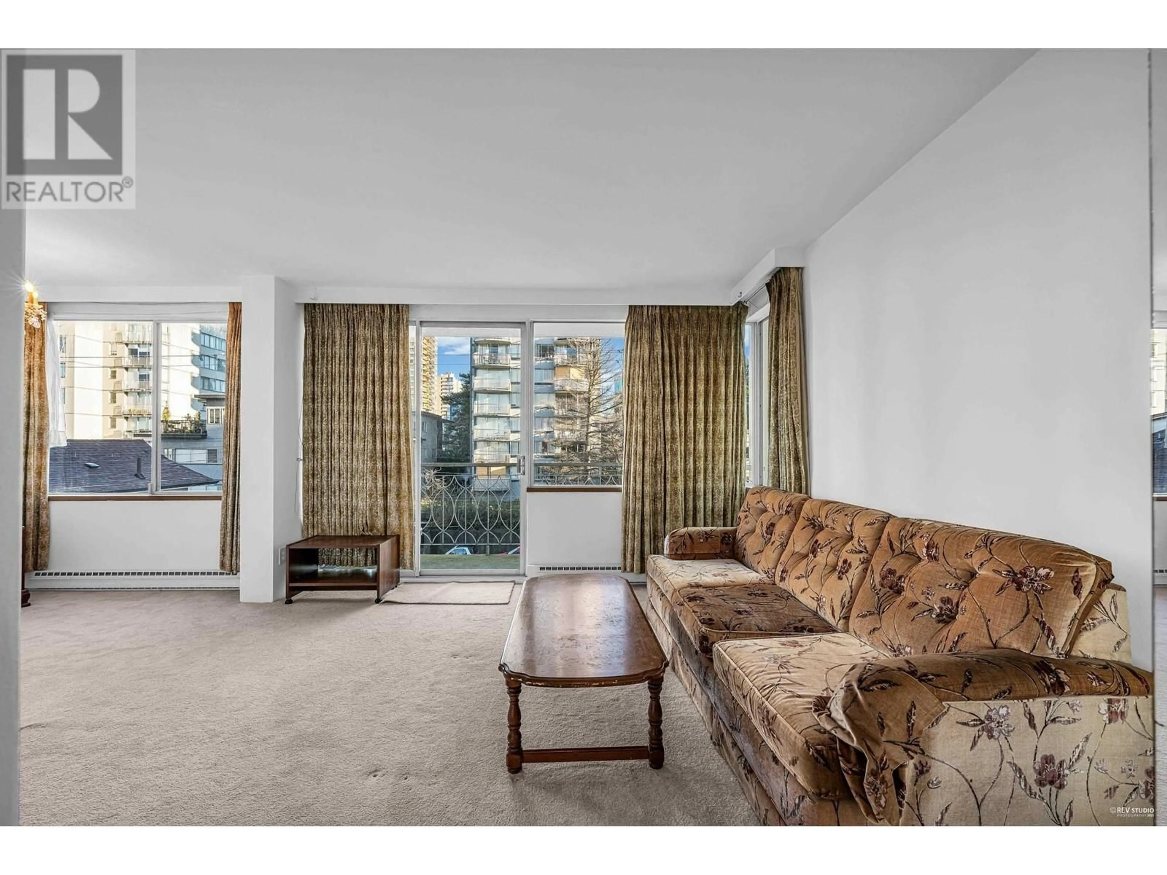 Living room with furniture, carpet floor for 501 1219 HARWOOD STREET, Vancouver British Columbia V6E1S5