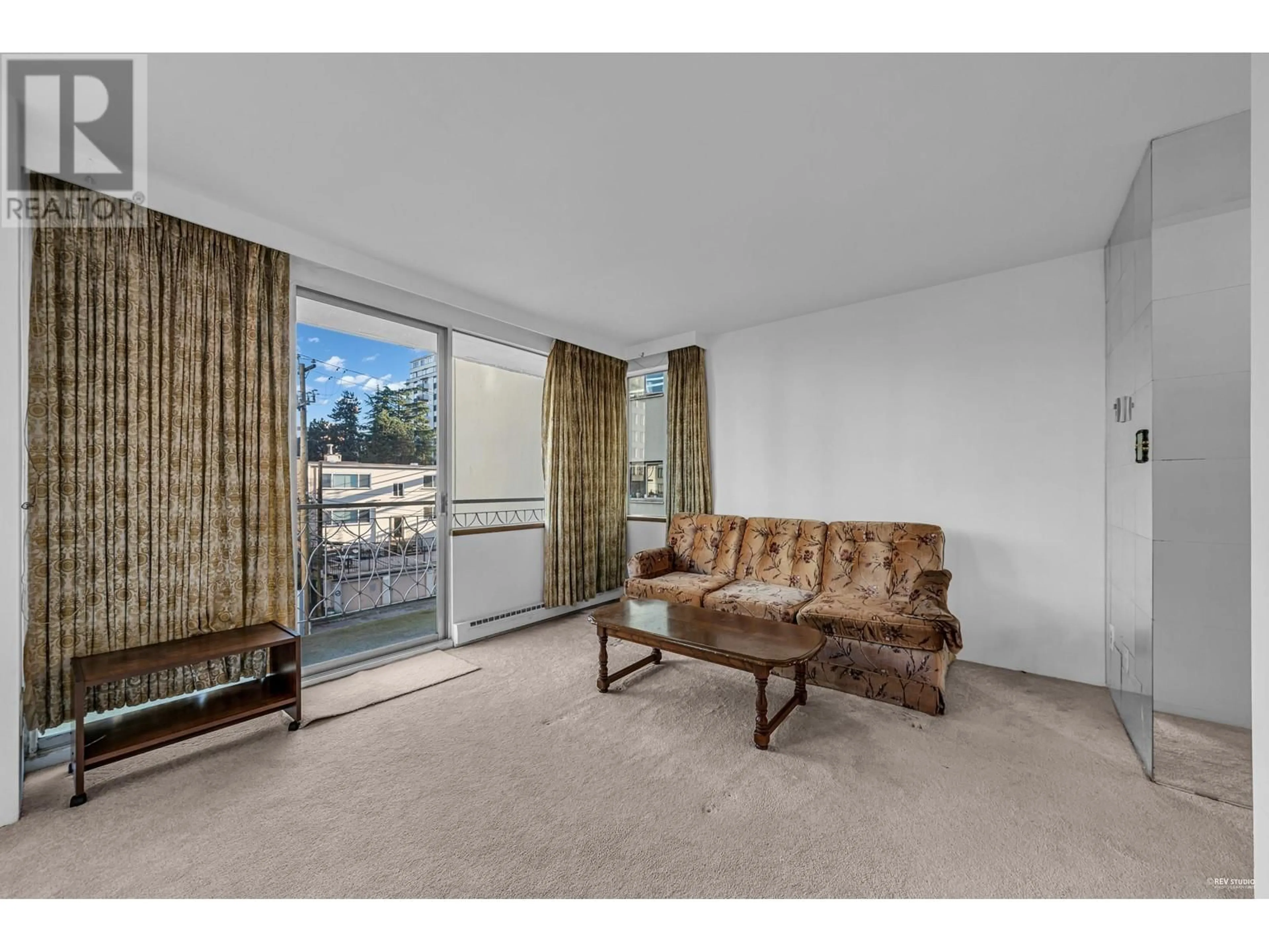 Living room with furniture, carpet floor for 501 1219 HARWOOD STREET, Vancouver British Columbia V6E1S5