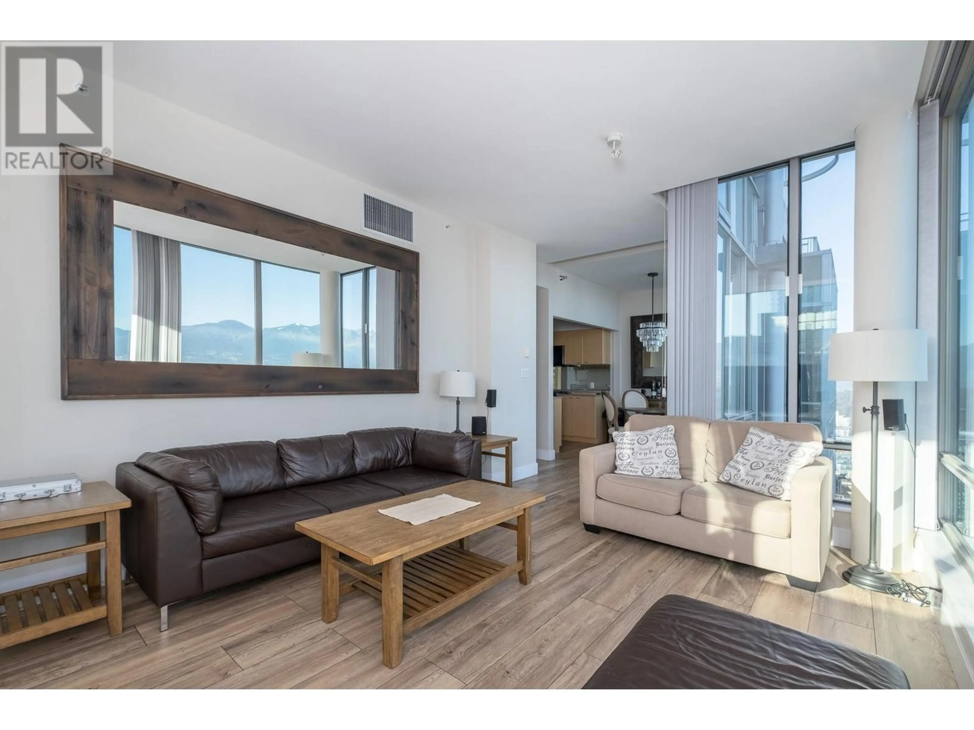 Living room with furniture, wood/laminate floor for PH2 1288 W GEORGIA STREET, Vancouver British Columbia V6E4R3