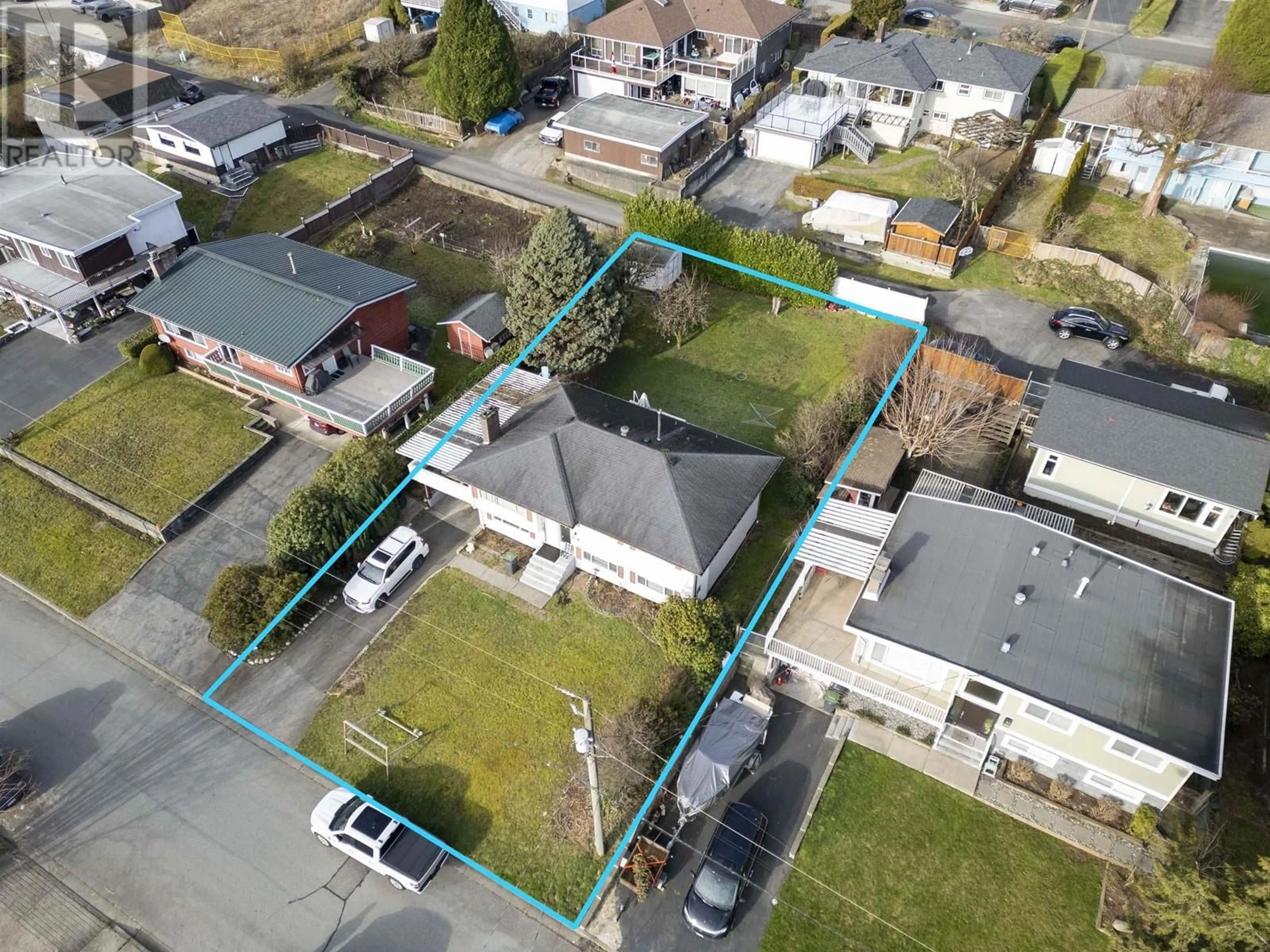 A pic from outside/outdoor area/front of a property/back of a property/a pic from drone, street for 1153 MADORE AVENUE, Coquitlam British Columbia V3K3C1