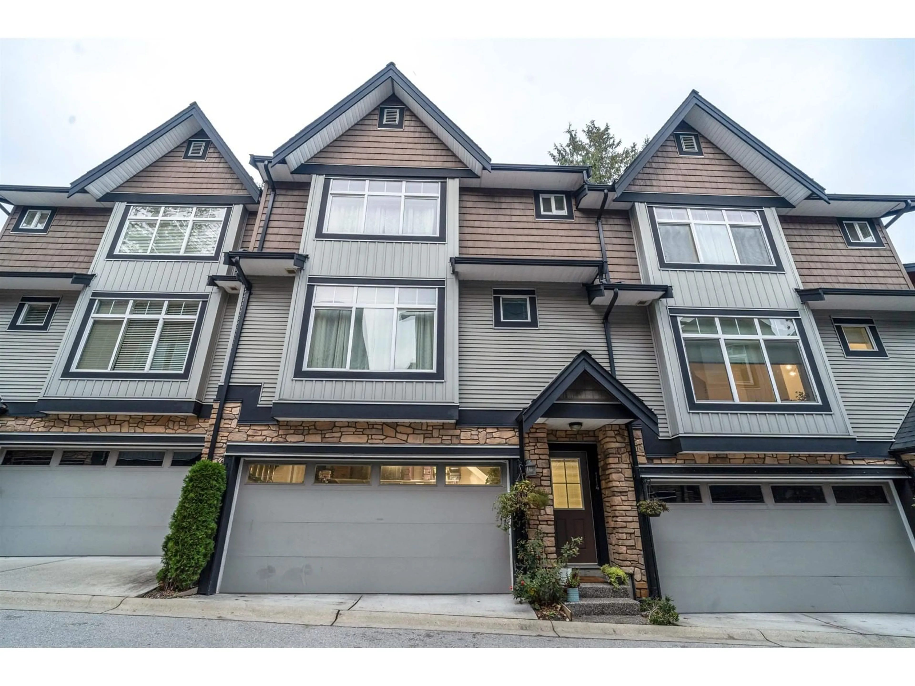 Home with vinyl exterior material, street for 114 6299 144 STREET, Surrey British Columbia V3X1A2