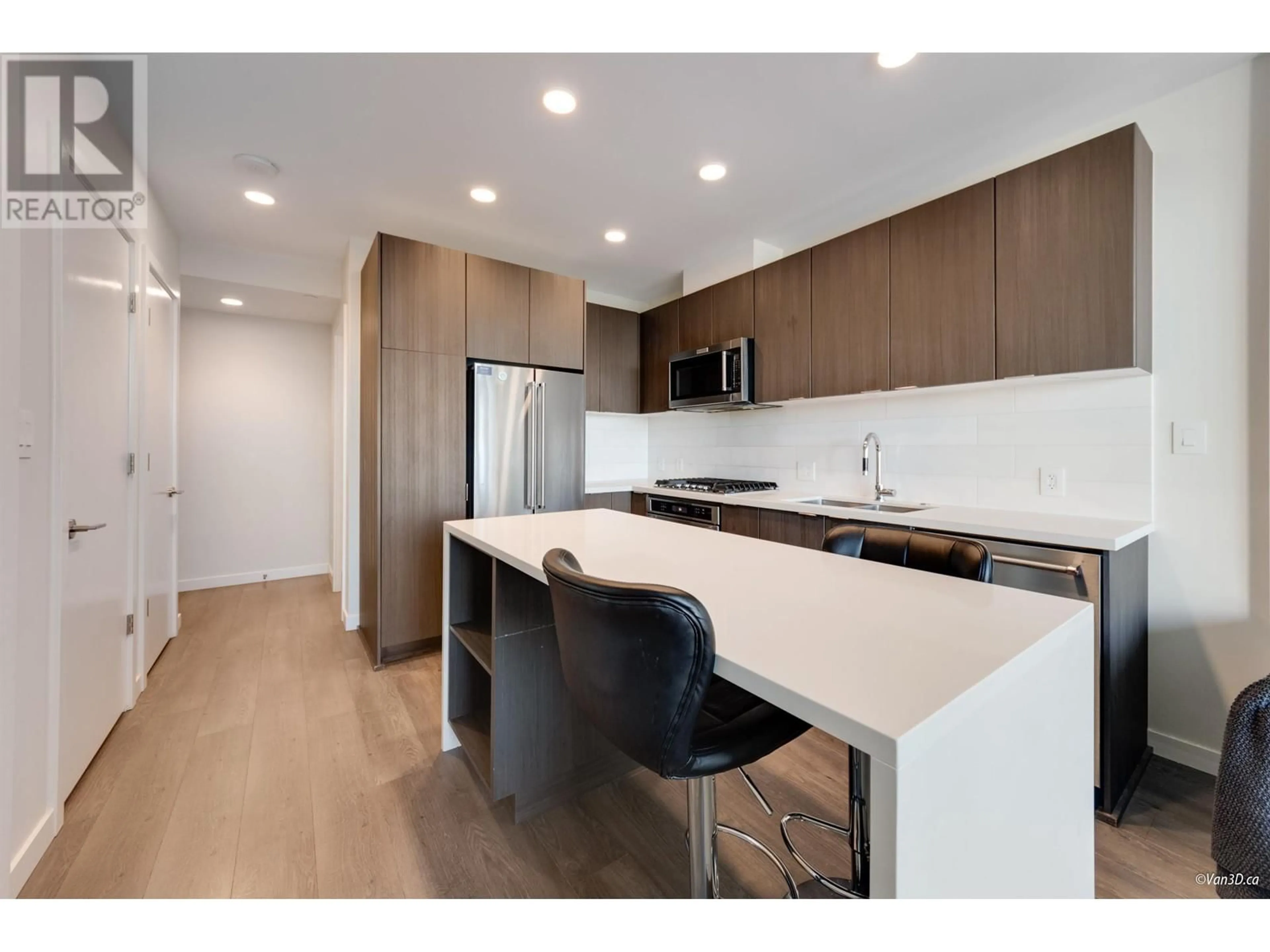 Open concept kitchen, wood/laminate floor for 2201 530 WHITING WAY, Coquitlam British Columbia V3J0J4