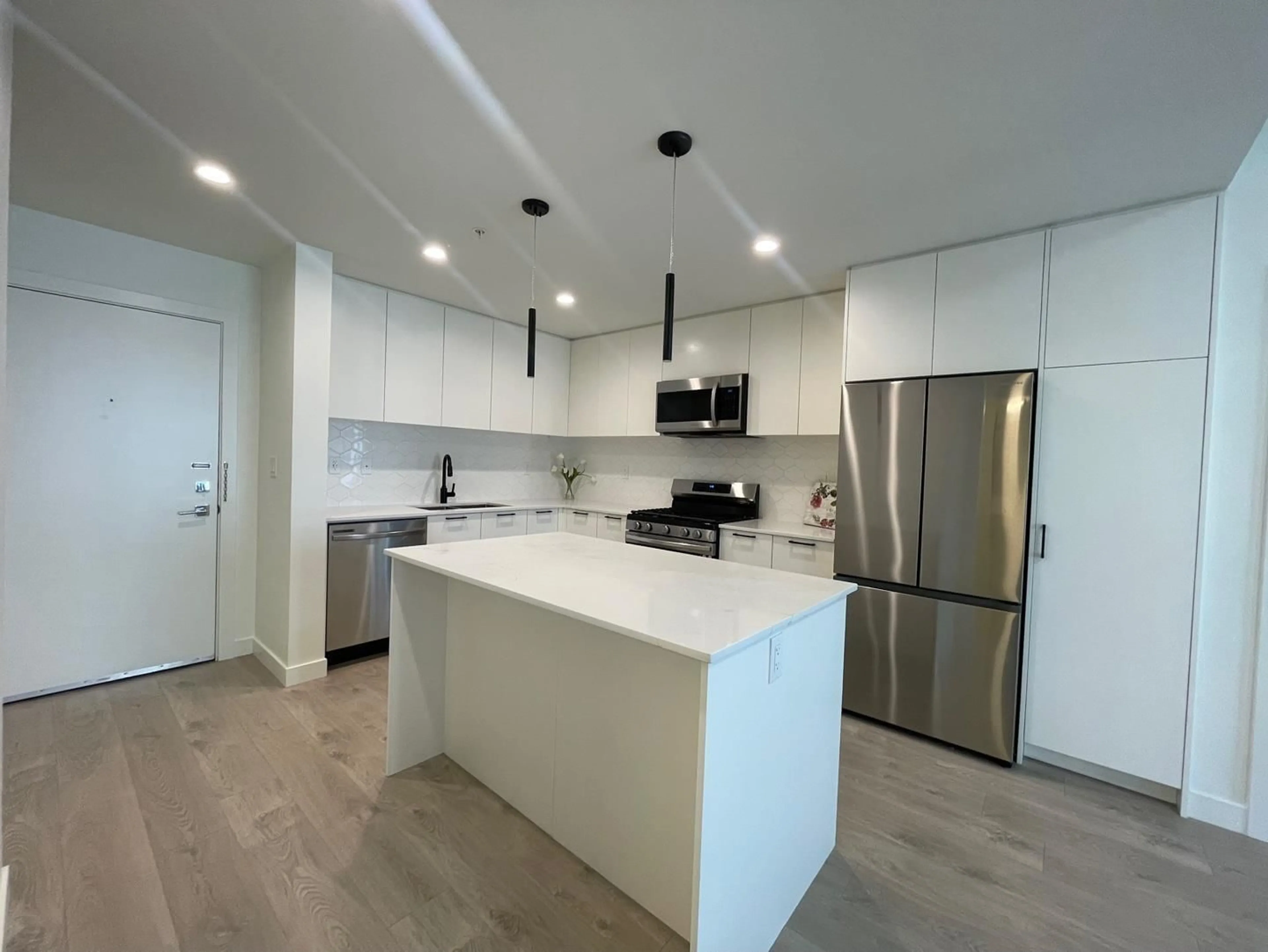 Open concept kitchen, unknown for 310 8379 201 STREET, Langley British Columbia V2Y3S6