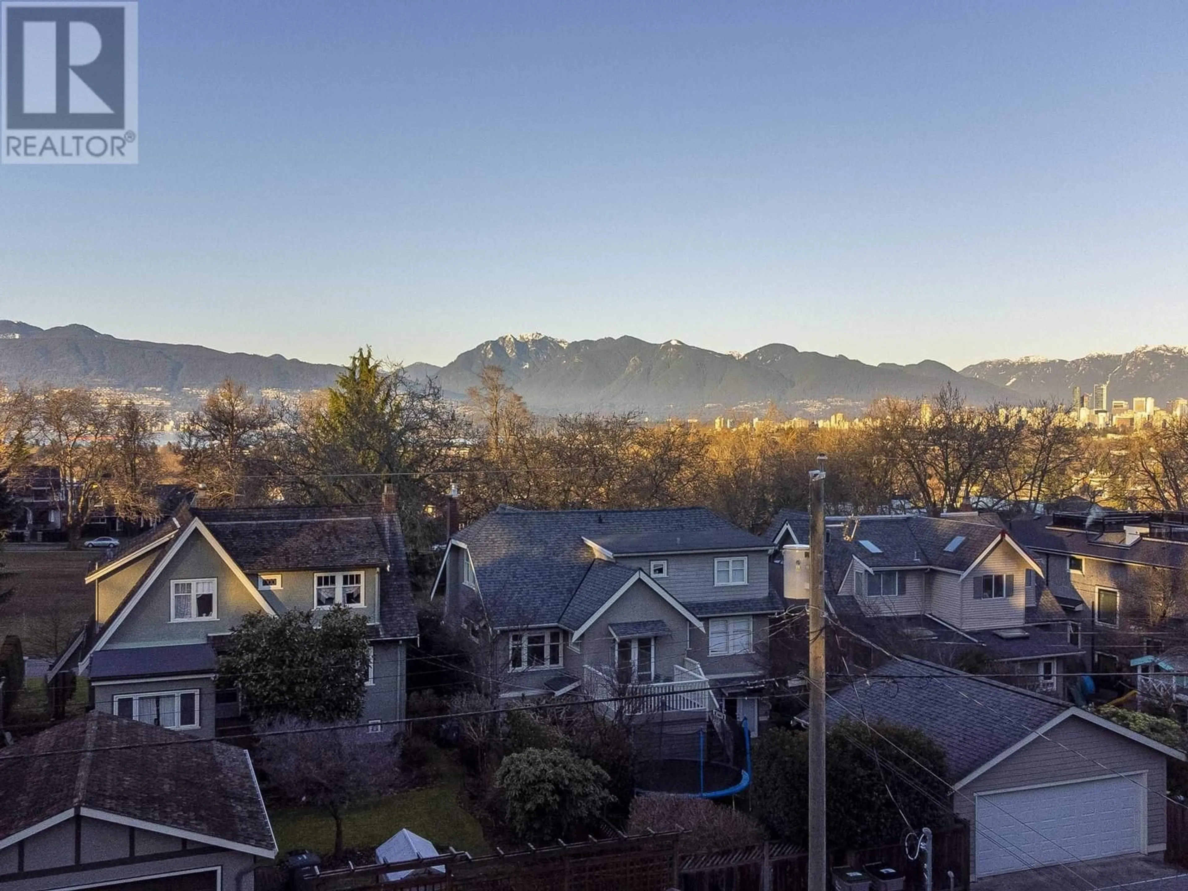 A pic from outside/outdoor area/front of a property/back of a property/a pic from drone, mountain view for 3229 W 24TH AVENUE, Vancouver British Columbia V6L1R8