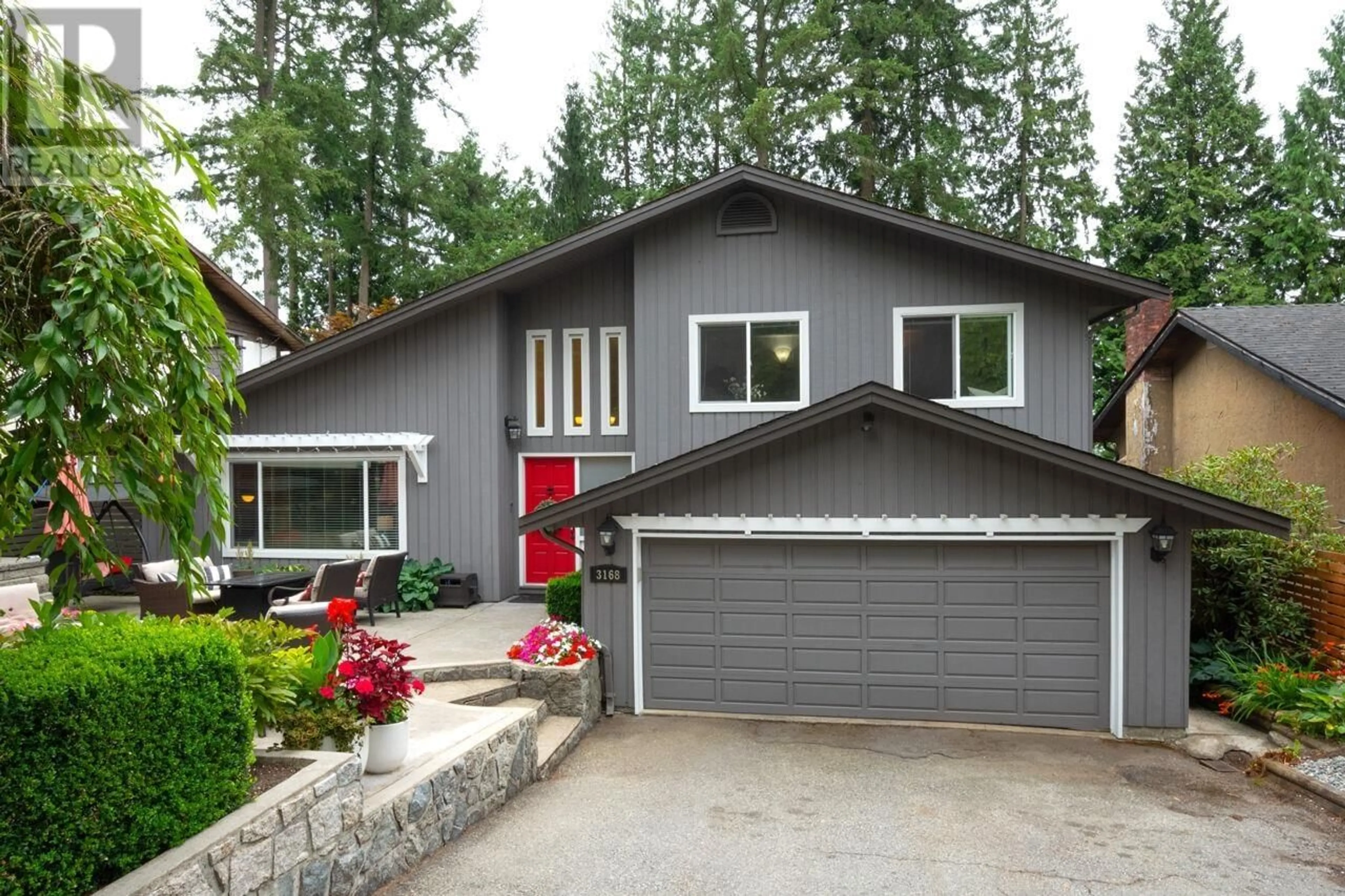 Home with vinyl exterior material, street for 3168 MT SEYMOUR PARKWAY, North Vancouver British Columbia V7H1G3