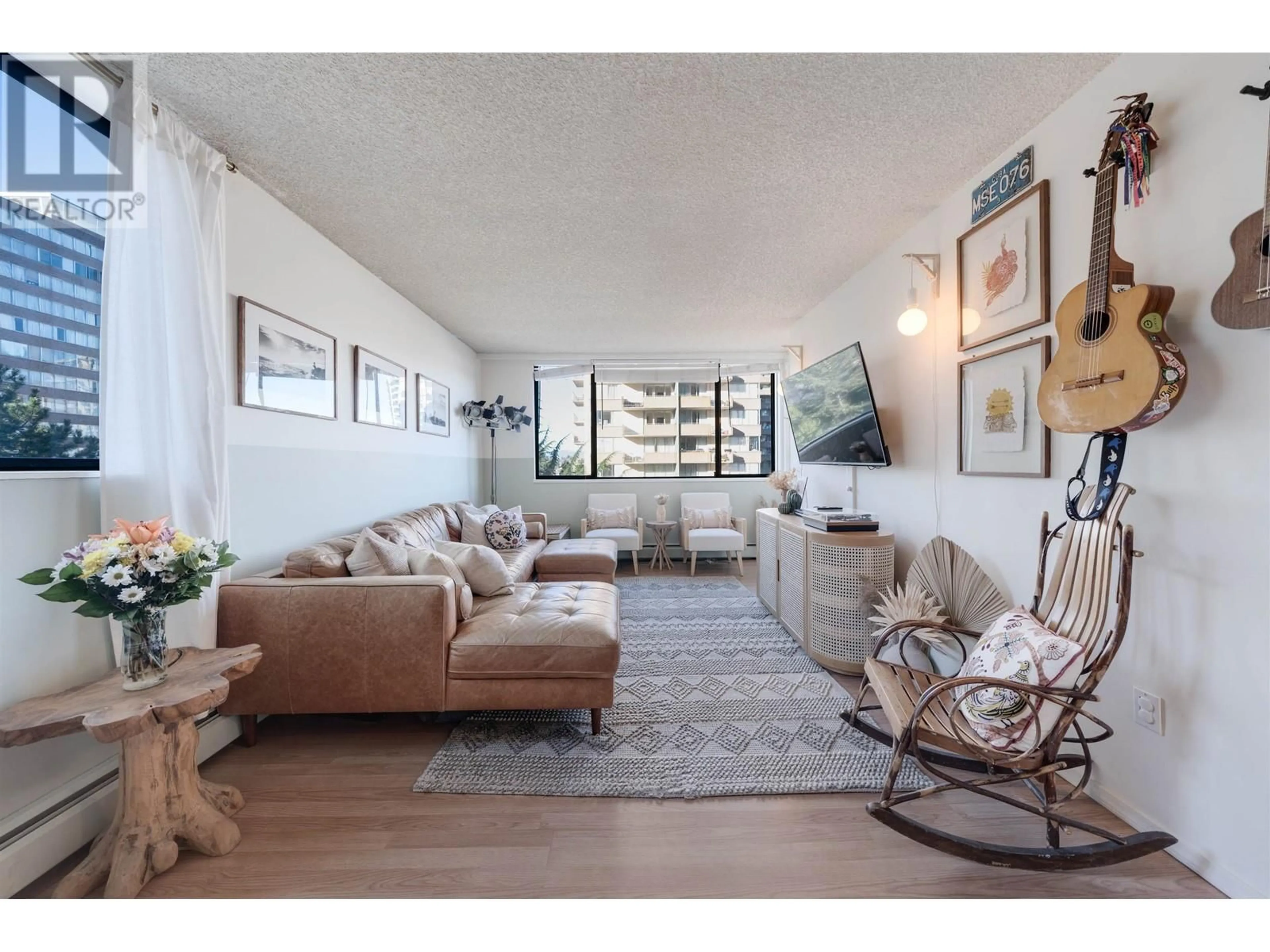 Living room with furniture, wood/laminate floor for 701 620 SEVENTH AVENUE, New Westminster British Columbia V3M5T6