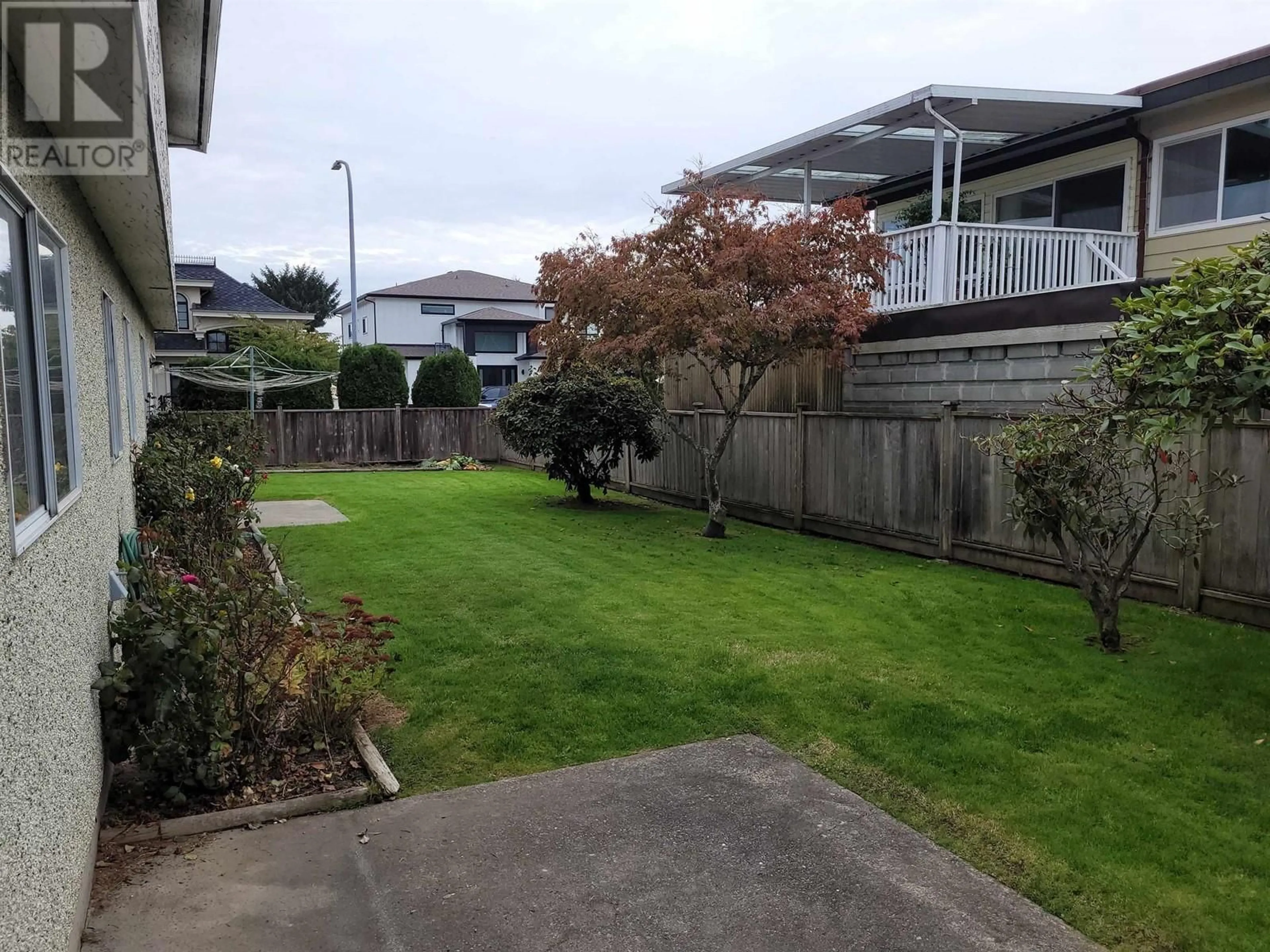 A pic from outside/outdoor area/front of a property/back of a property/a pic from drone, street for 8460 GREENFIELD DRIVE, Richmond British Columbia V7A4N6