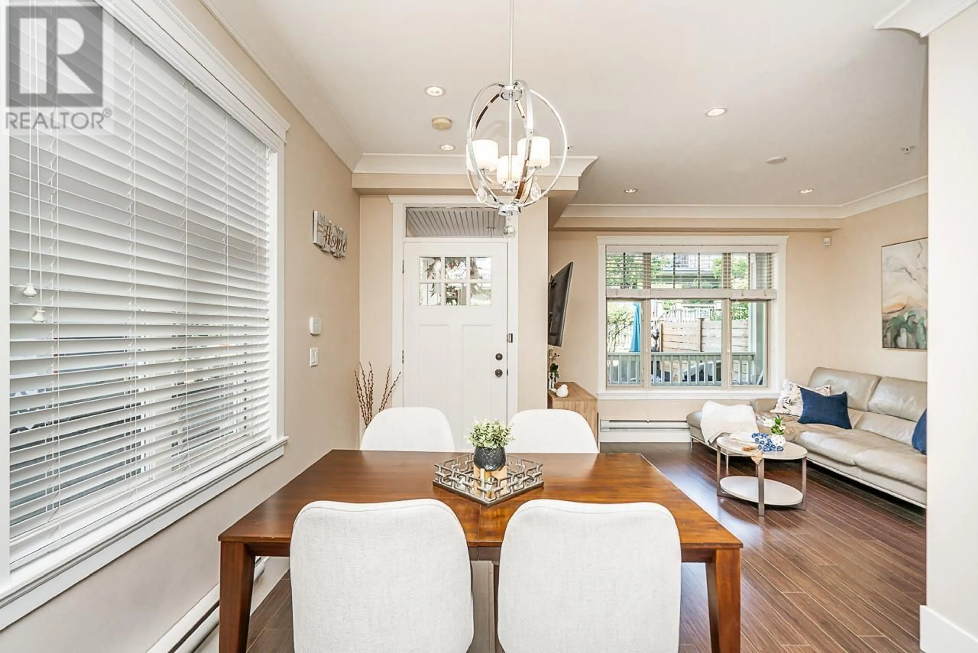 Dining room, wood/laminate floor for 1 3828 PENDER STREET, Burnaby British Columbia V5C2L5