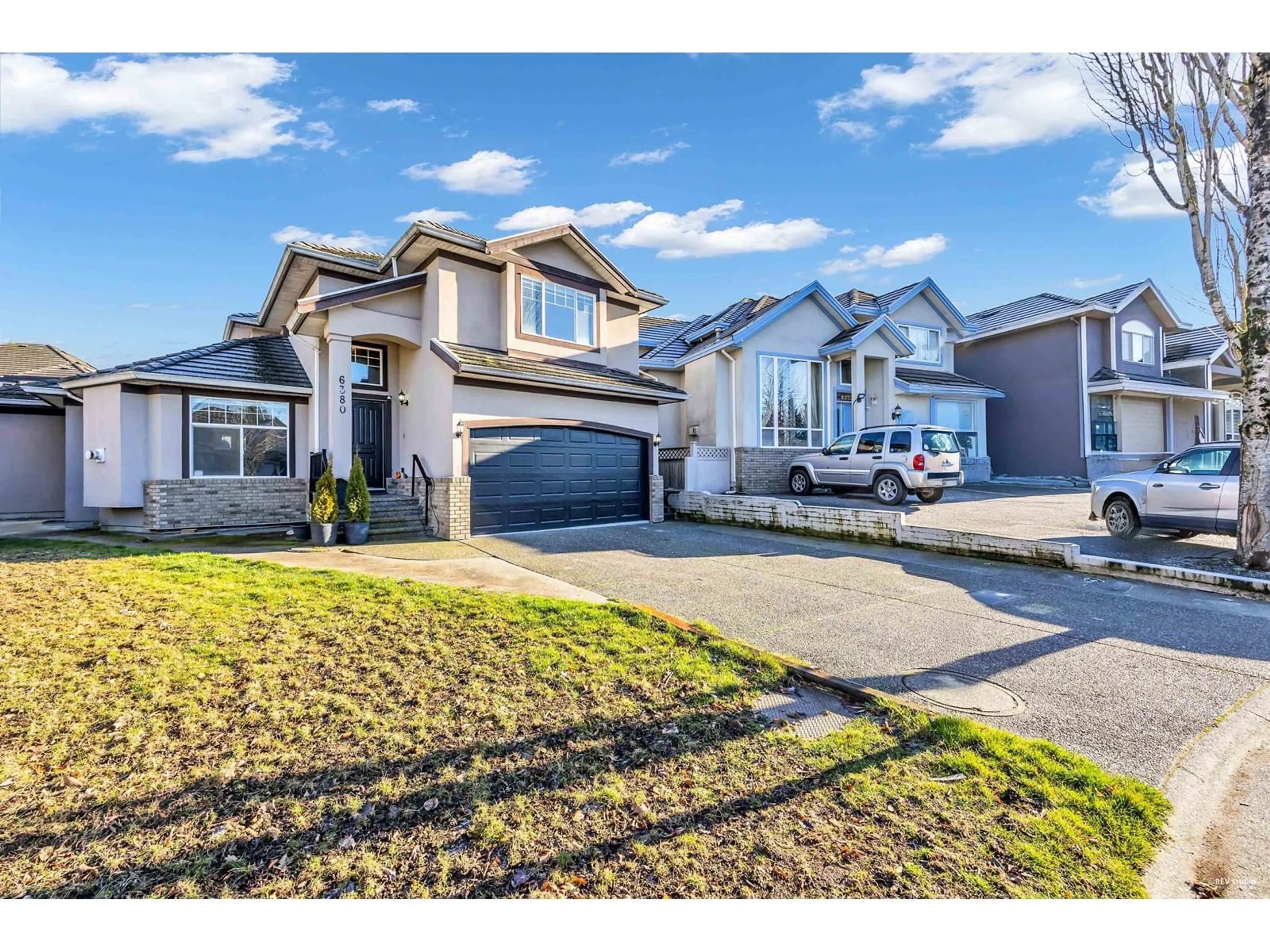 Home with vinyl exterior material, street for 6380 125A, Surrey British Columbia V3X3N1