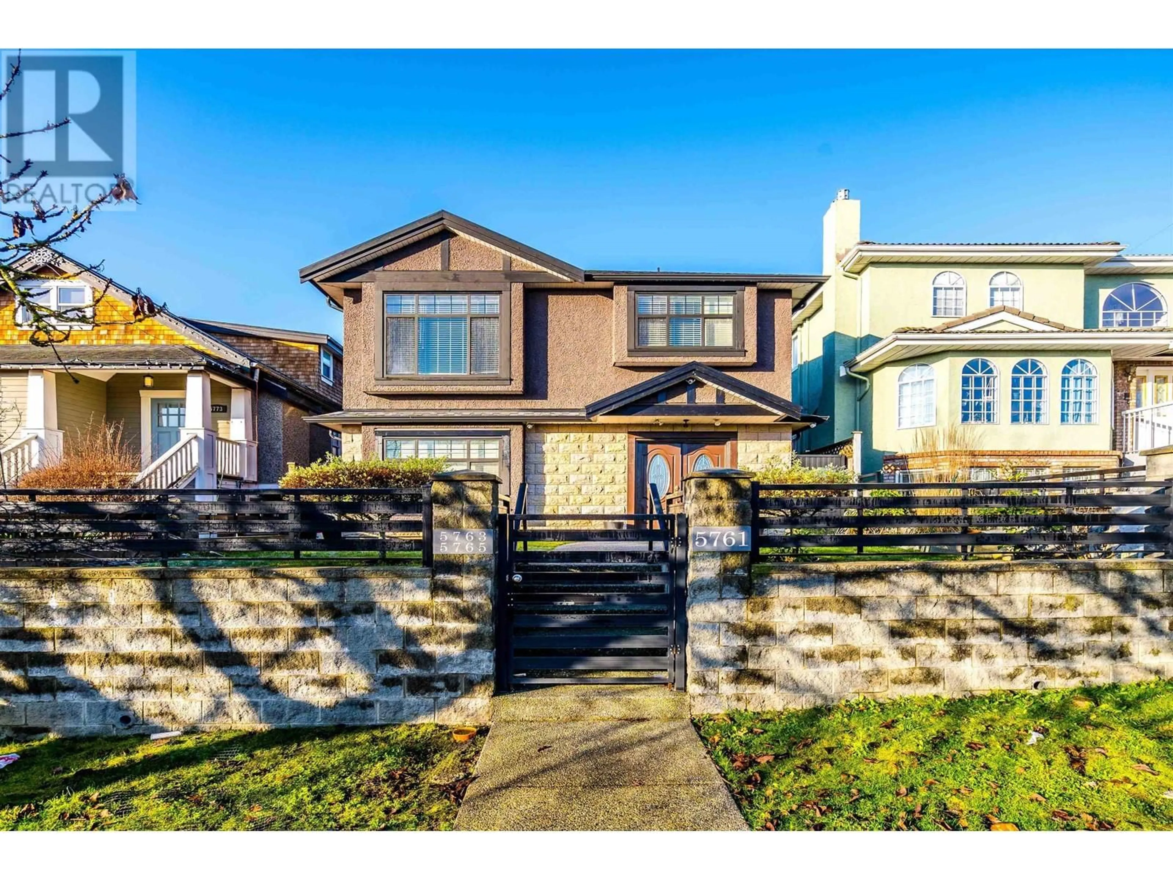 Home with vinyl exterior material, street for 5761 INVERNESS STREET, Vancouver British Columbia V5W3P6