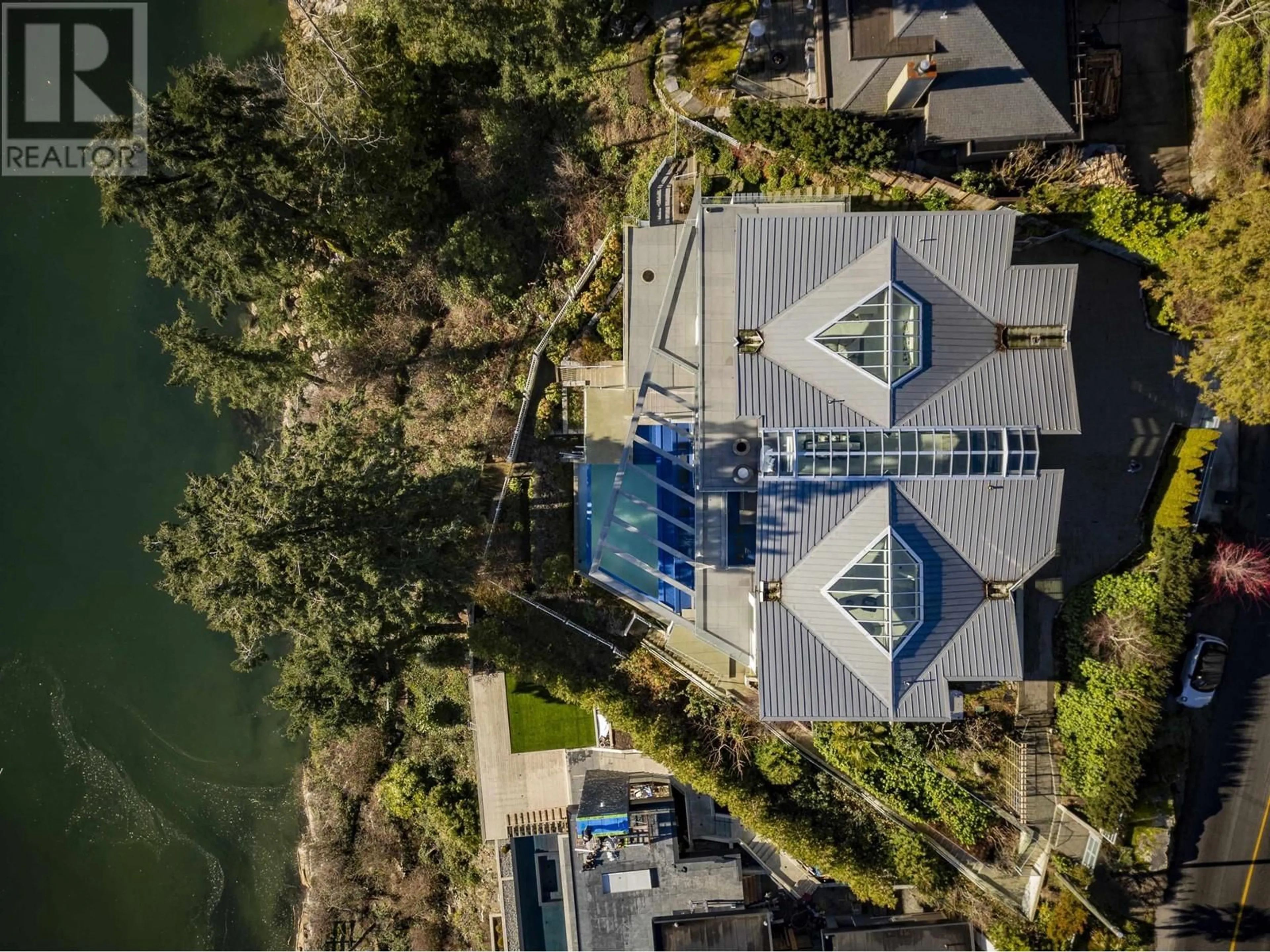 A pic from outside/outdoor area/front of a property/back of a property/a pic from drone, water/lake/river/ocean view for 4580 MARINE DRIVE, West Vancouver British Columbia V7W2N9