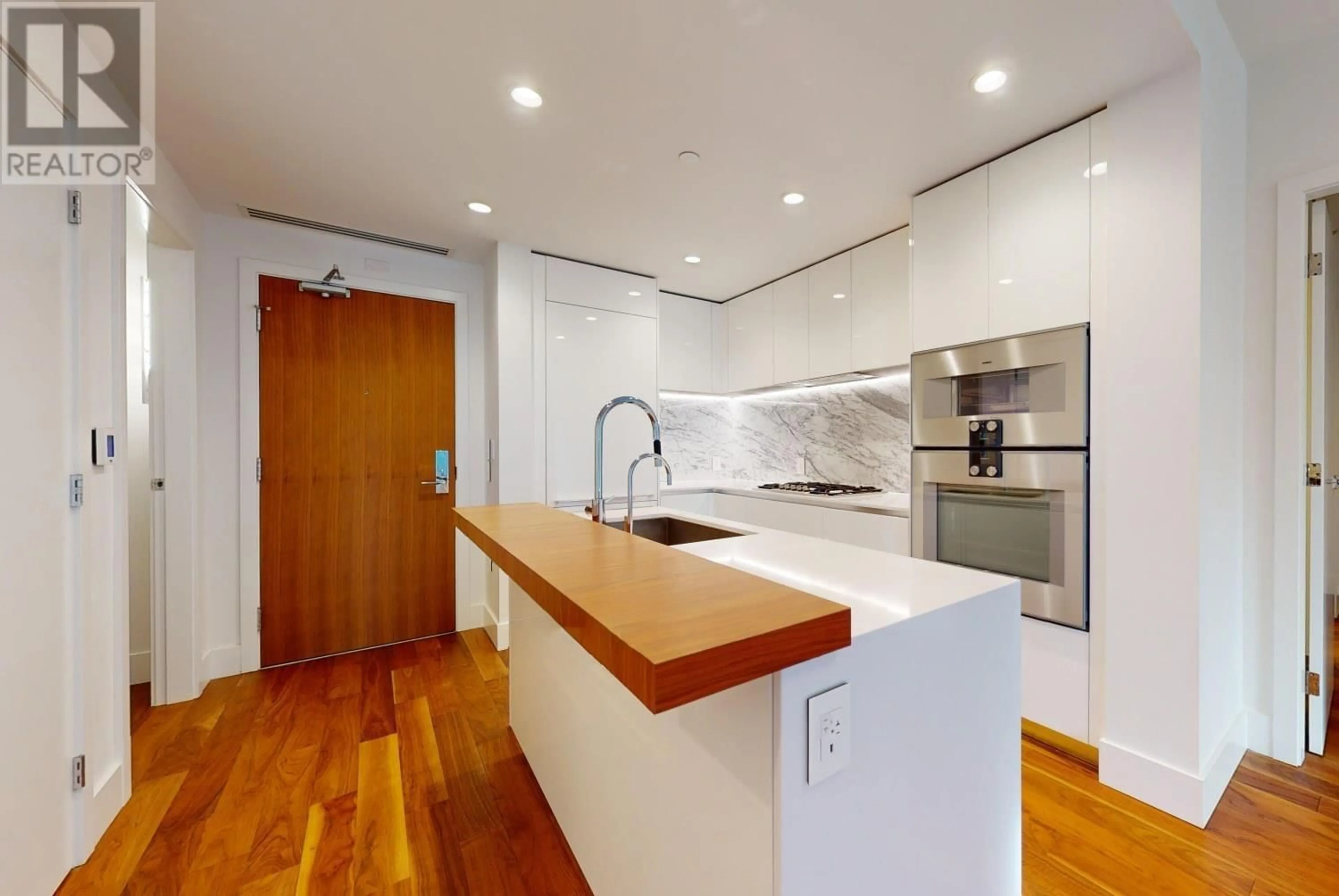 Contemporary kitchen, wood/laminate floor for 208 7428 ALBERTA STREET, Vancouver British Columbia V5X0J5