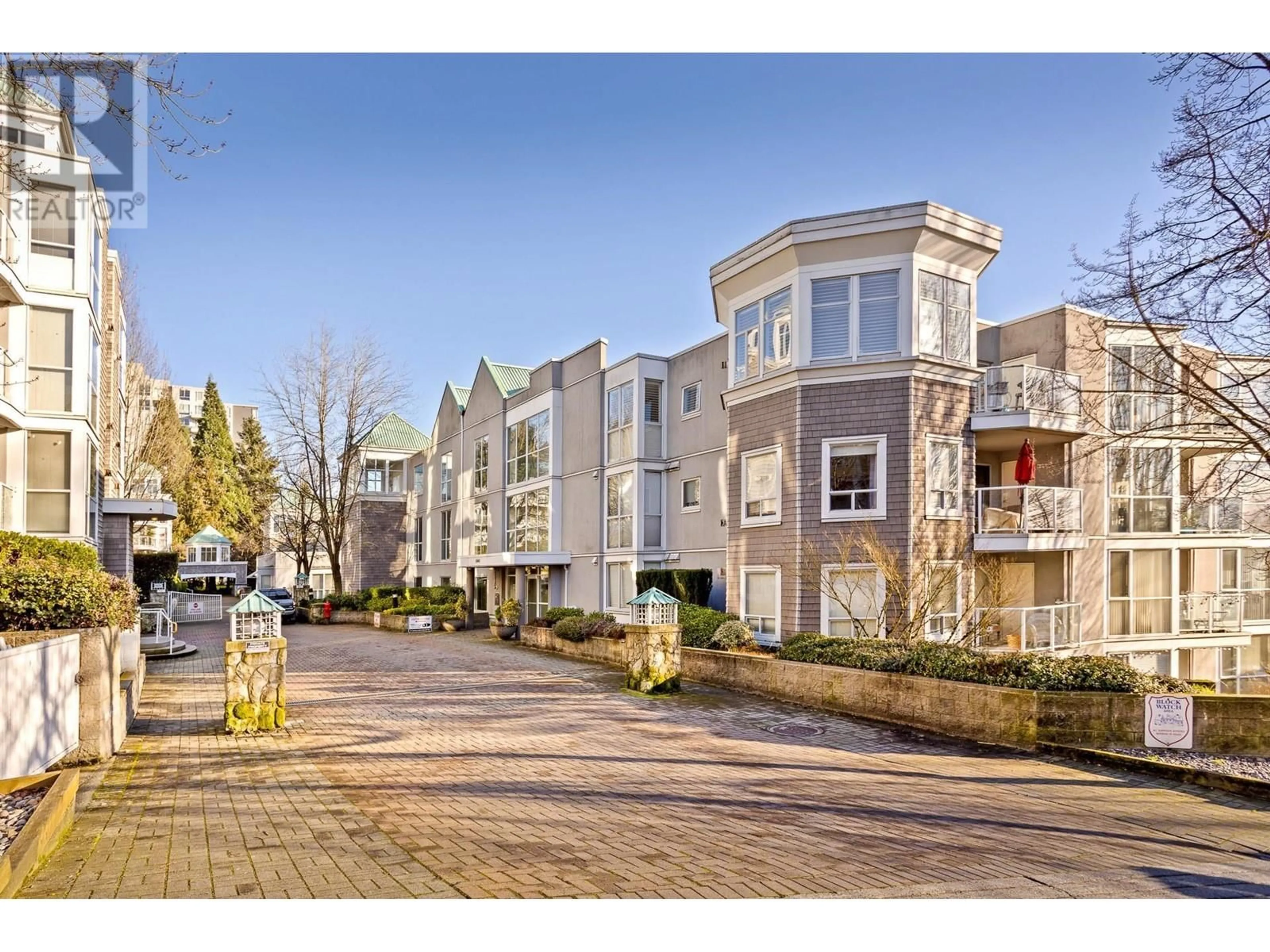A pic from outside/outdoor area/front of a property/back of a property/a pic from drone, street for 212 - 8460 JELLICOE STREET, Vancouver British Columbia V5S4S8