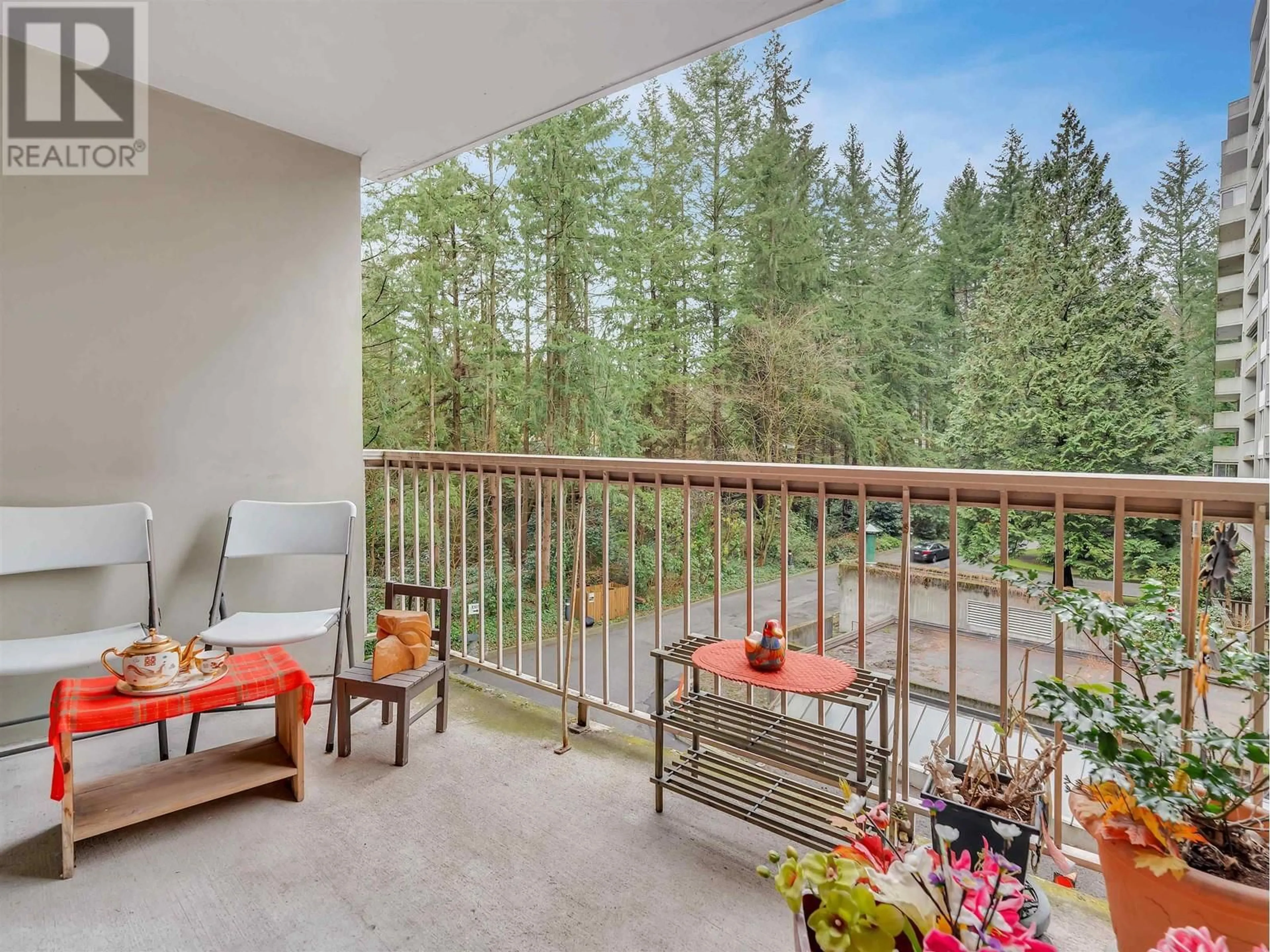 Balcony in the apartment, forest/trees view for 405 2024 FULLERTON AVENUE, North Vancouver British Columbia V7P3G4