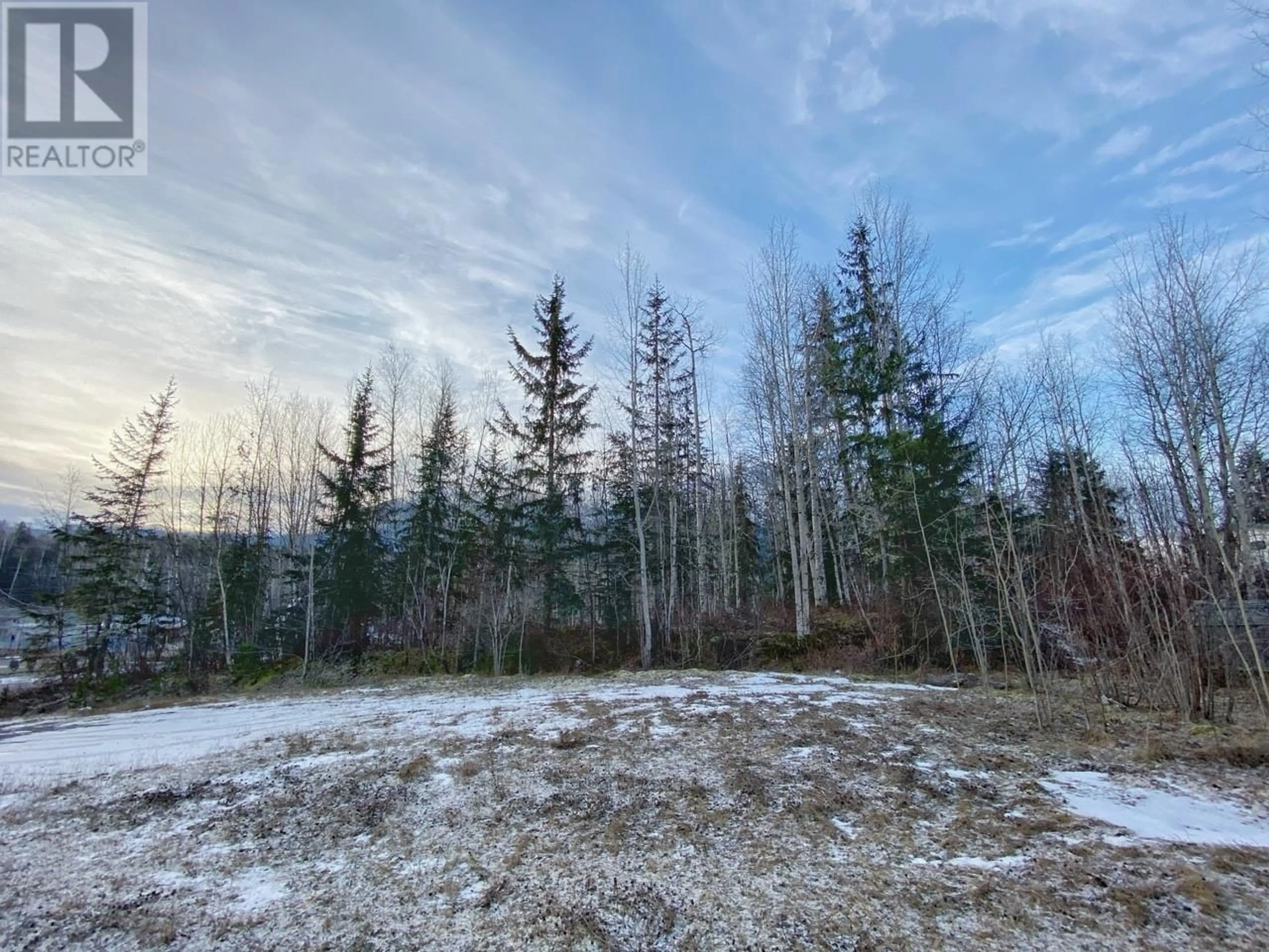 A pic from outside/outdoor area/front of a property/back of a property/a pic from drone, forest/trees view for 4982 7TH AVENUE, New Hazelton British Columbia V0J2J0