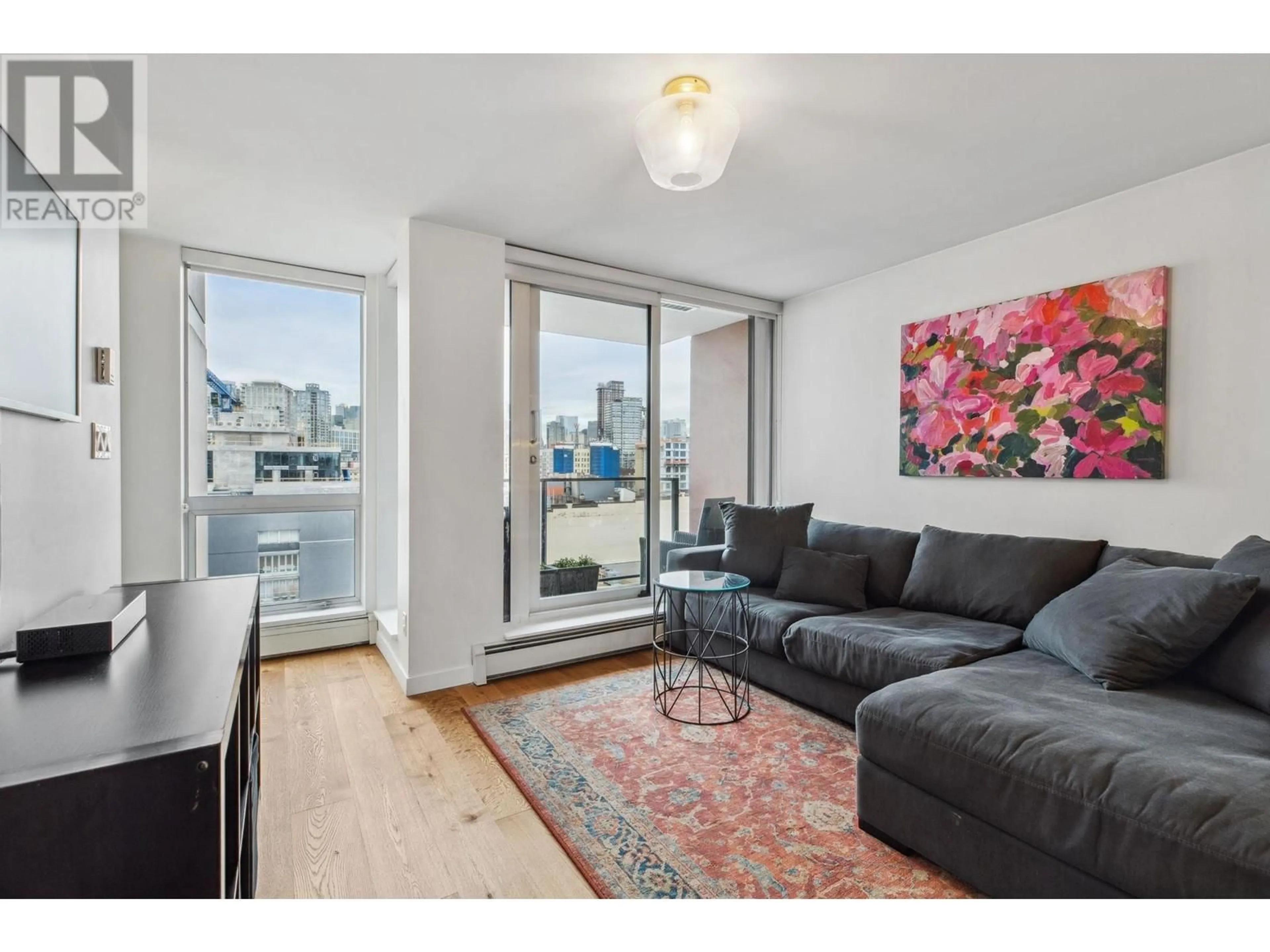 Living room with furniture, wood/laminate floor for 808 189 KEEFER STREET, Vancouver British Columbia V6A0C8