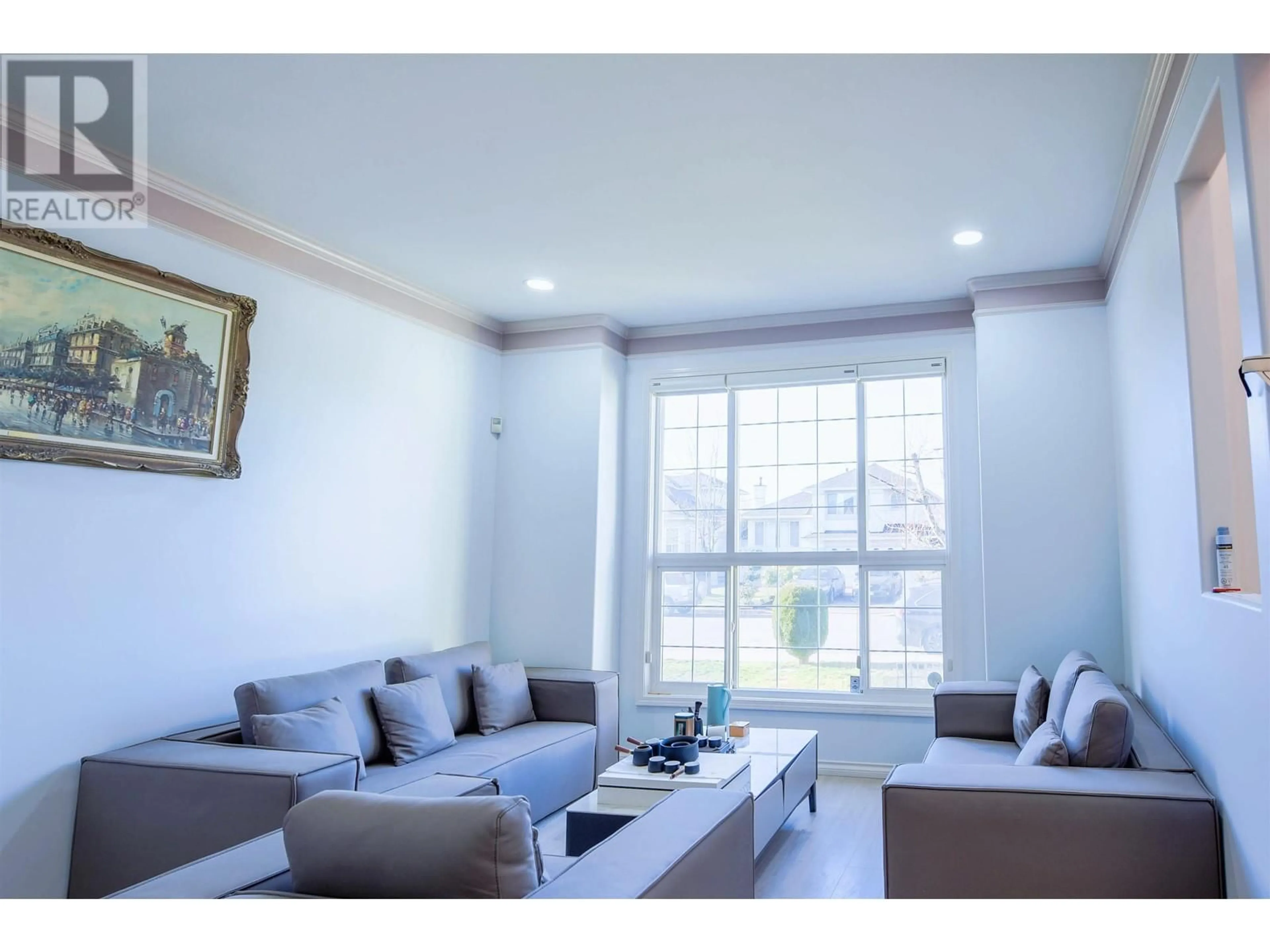 Living room with furniture, wood/laminate floor for 5500 MCCOLL CRESCENT, Richmond British Columbia V6V2L6