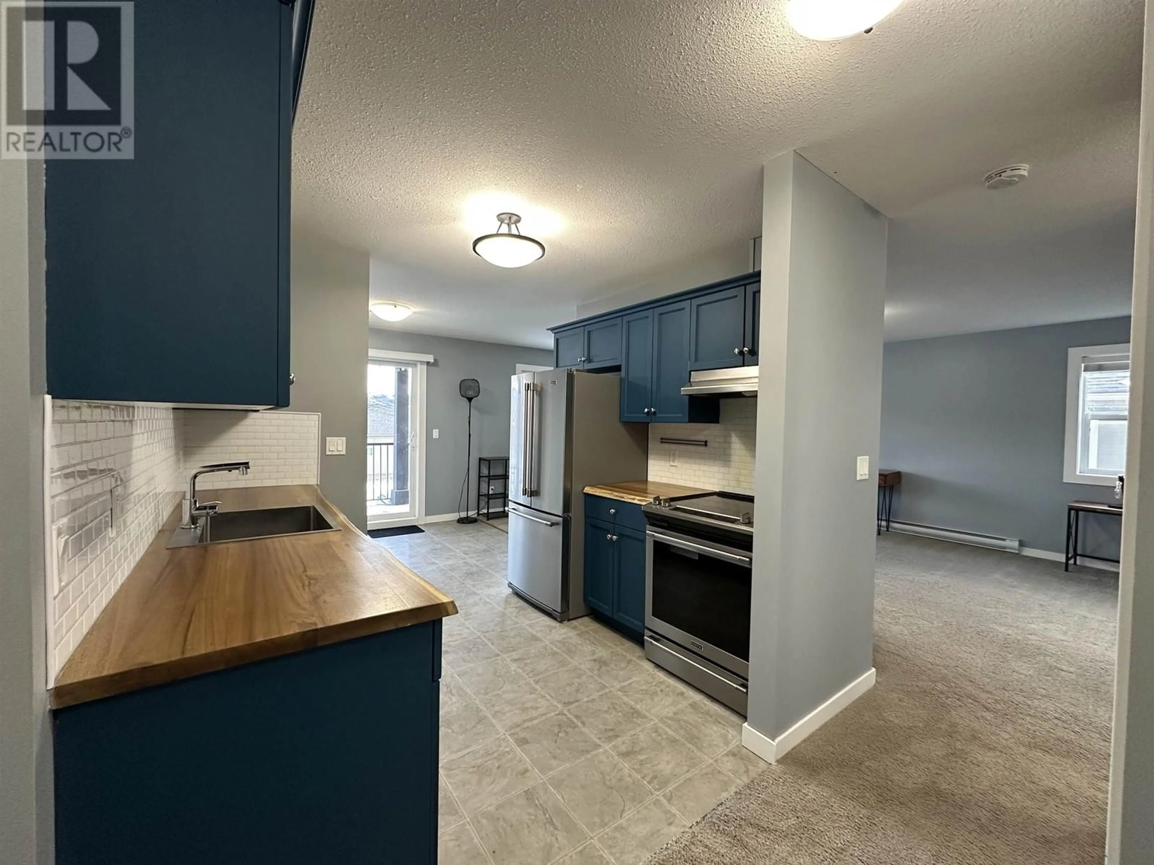 Open concept kitchen, unknown for 8 9707 99 AVENUE, Taylor British Columbia V0C2K0