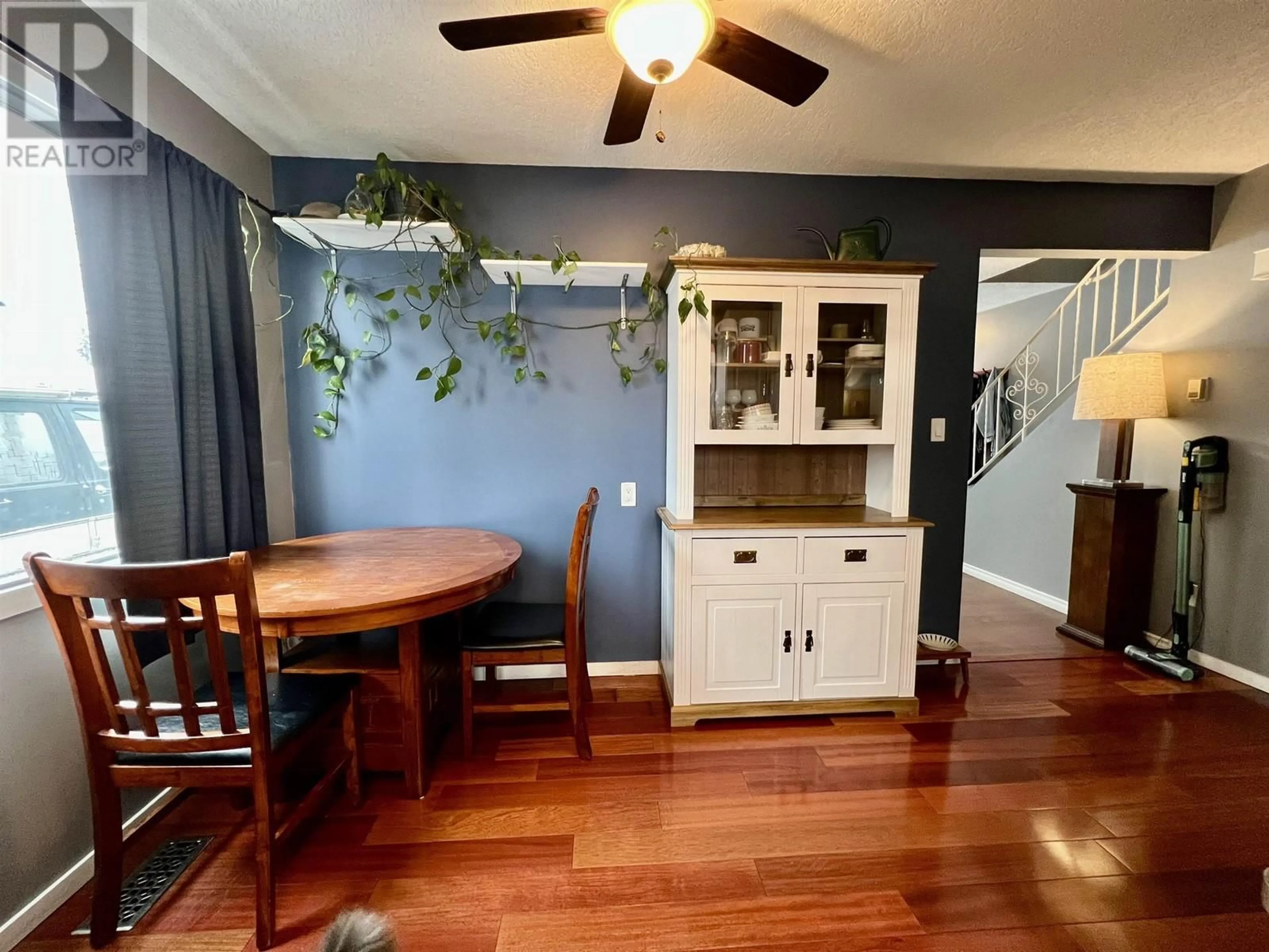 Dining room, wood/laminate floor for 4198 1ST AVENUE, Prince George British Columbia V2M5E6