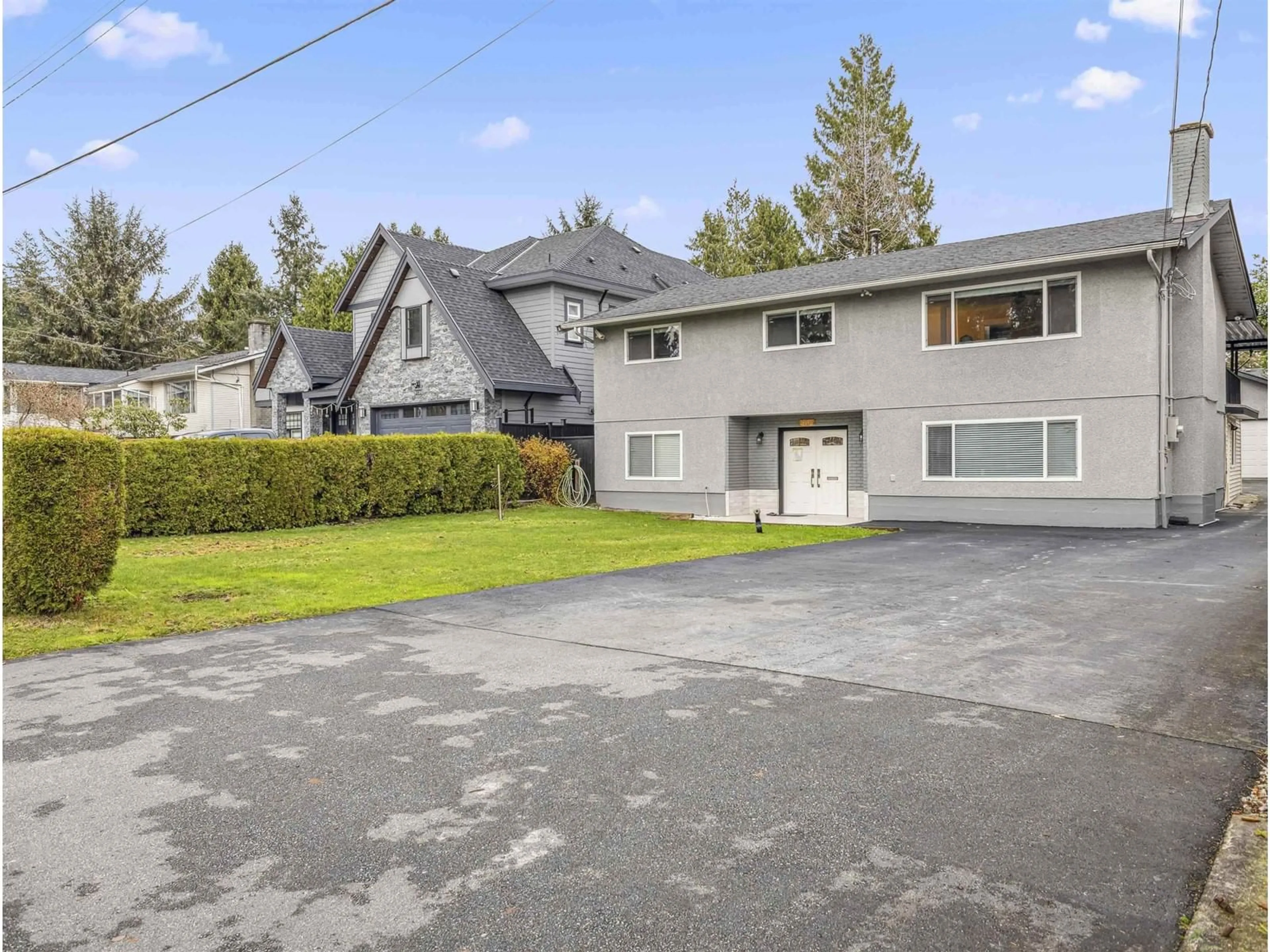 A pic from outside/outdoor area/front of a property/back of a property/a pic from drone, street for 9112 147TH STREET, Surrey British Columbia V3R3V7