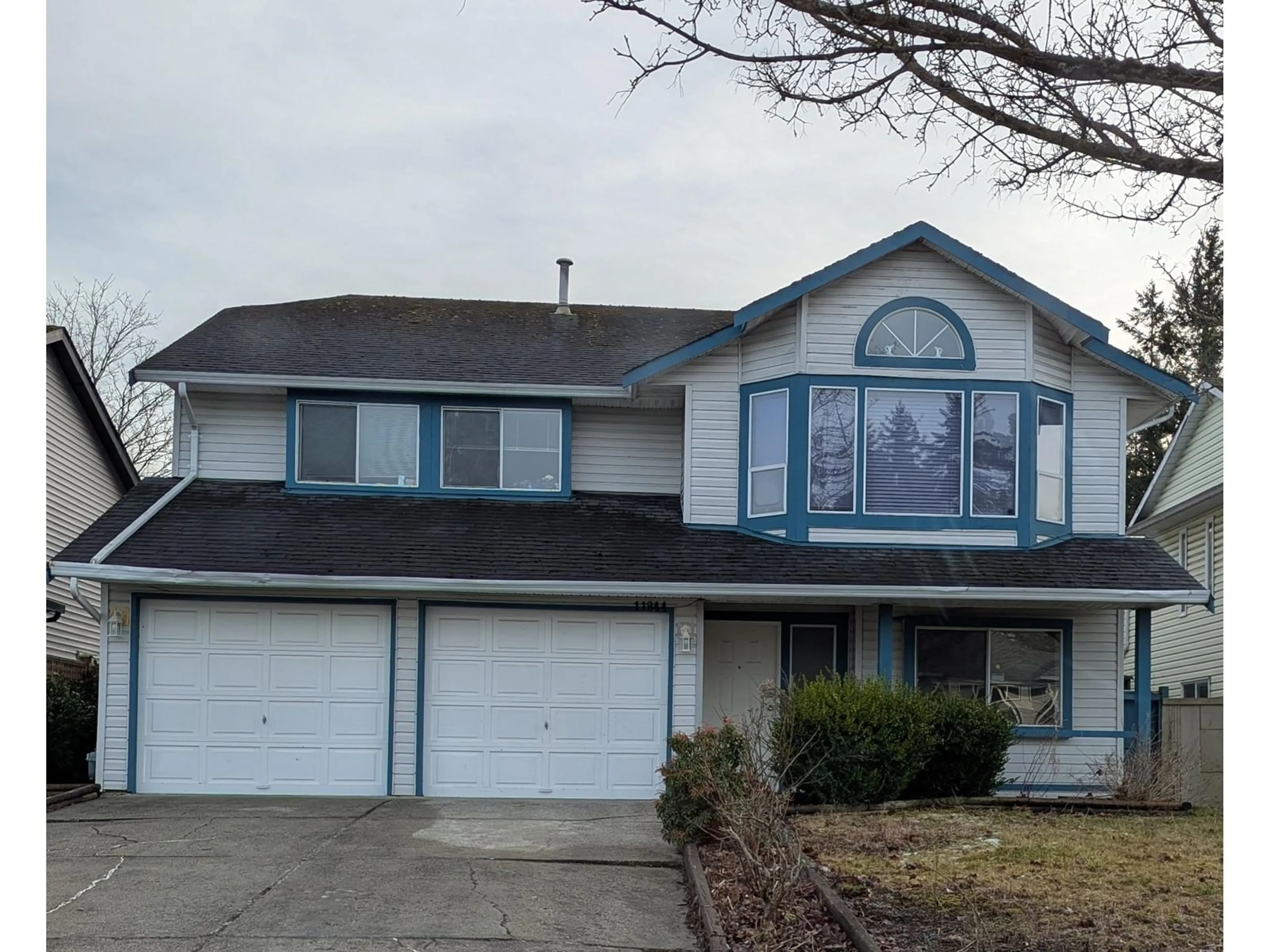 Home with vinyl exterior material, street for 11844 98 AVENUE, Surrey British Columbia V3V2J4