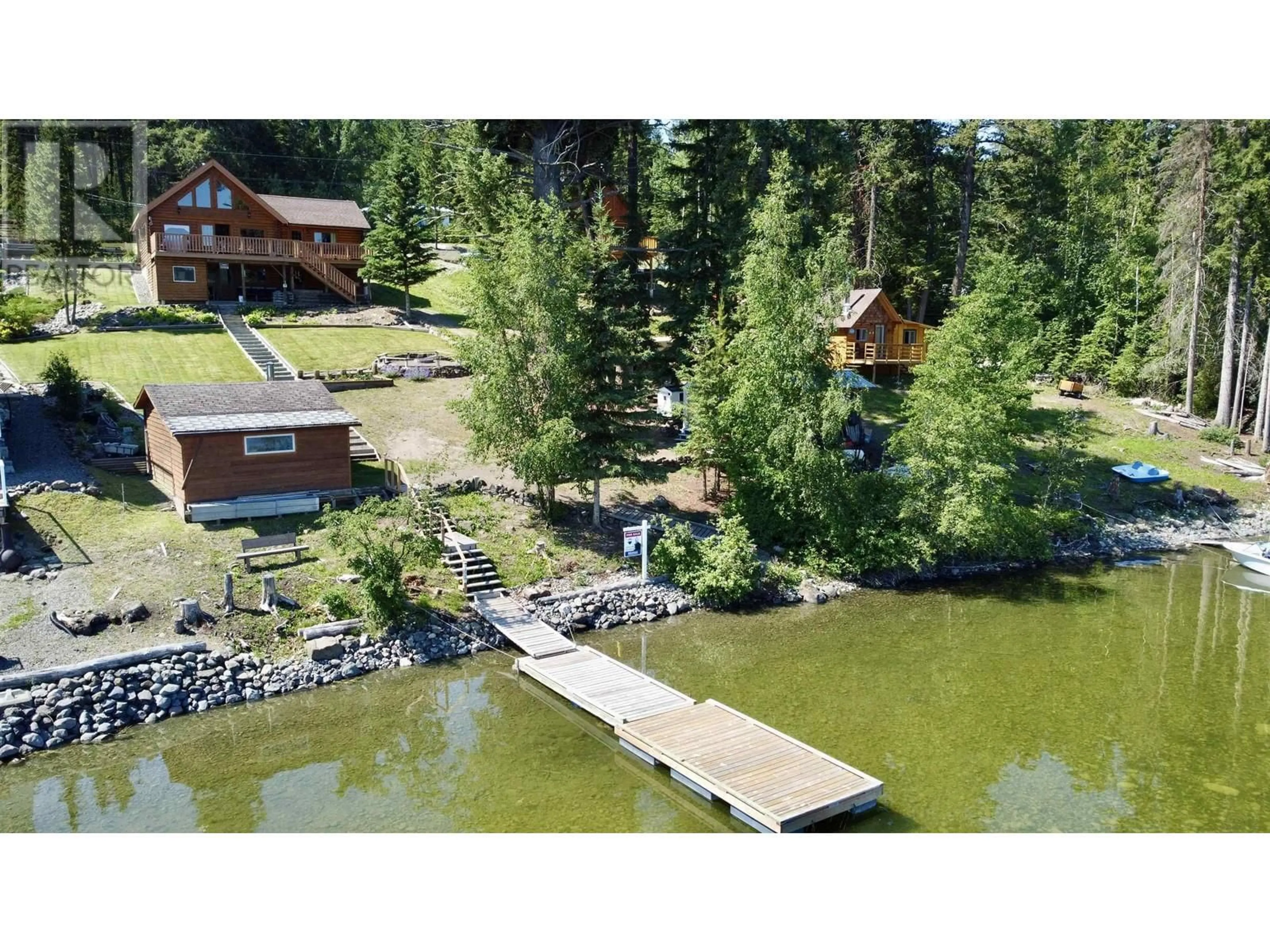 A pic from outside/outdoor area/front of a property/back of a property/a pic from drone, water/lake/river/ocean view for 6315 MULLIGAN DRIVE, Horse Lake British Columbia V0K2E3