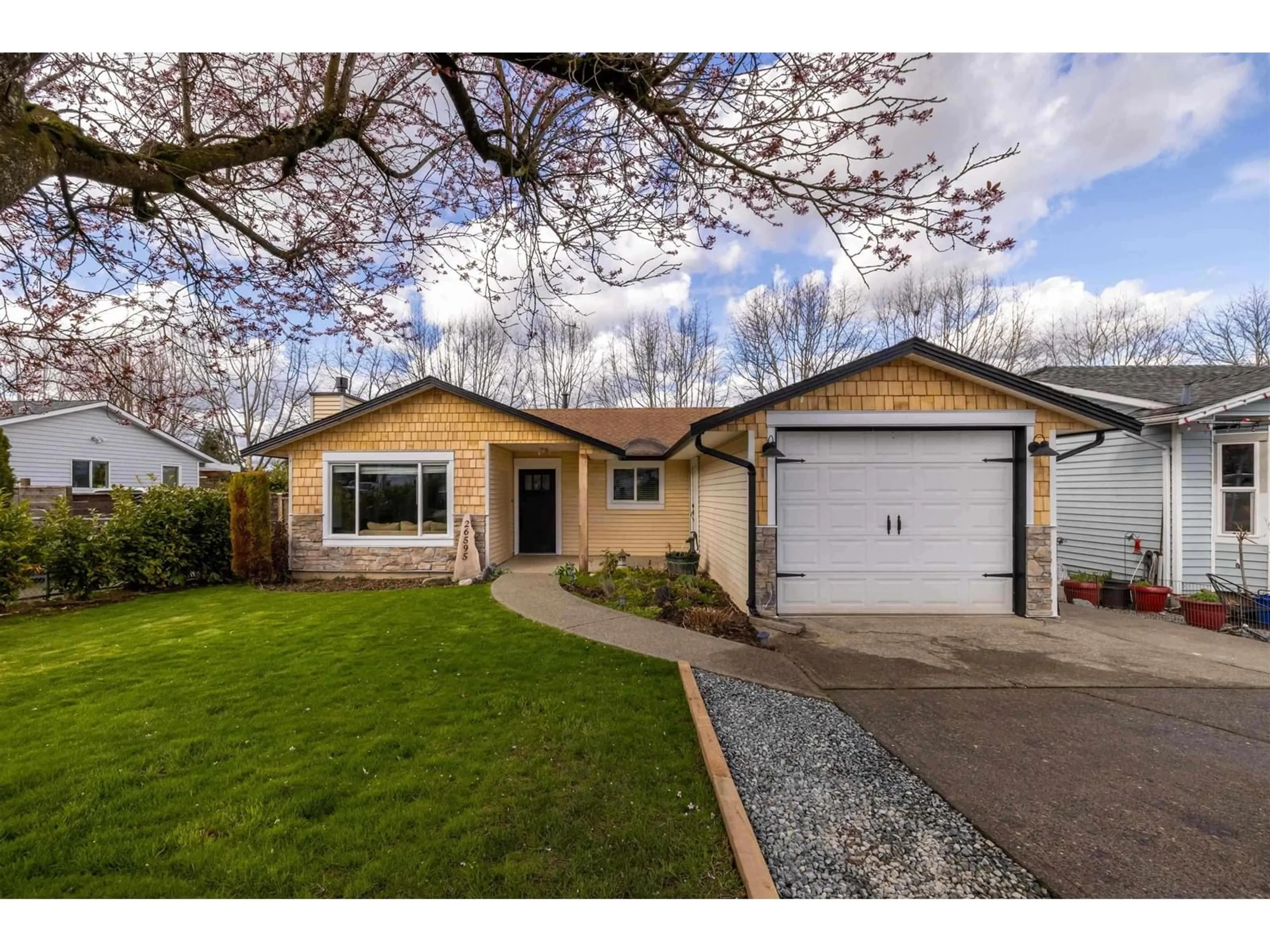 Home with vinyl exterior material, street for 26595 30A AVENUE, Langley British Columbia V4W3C8