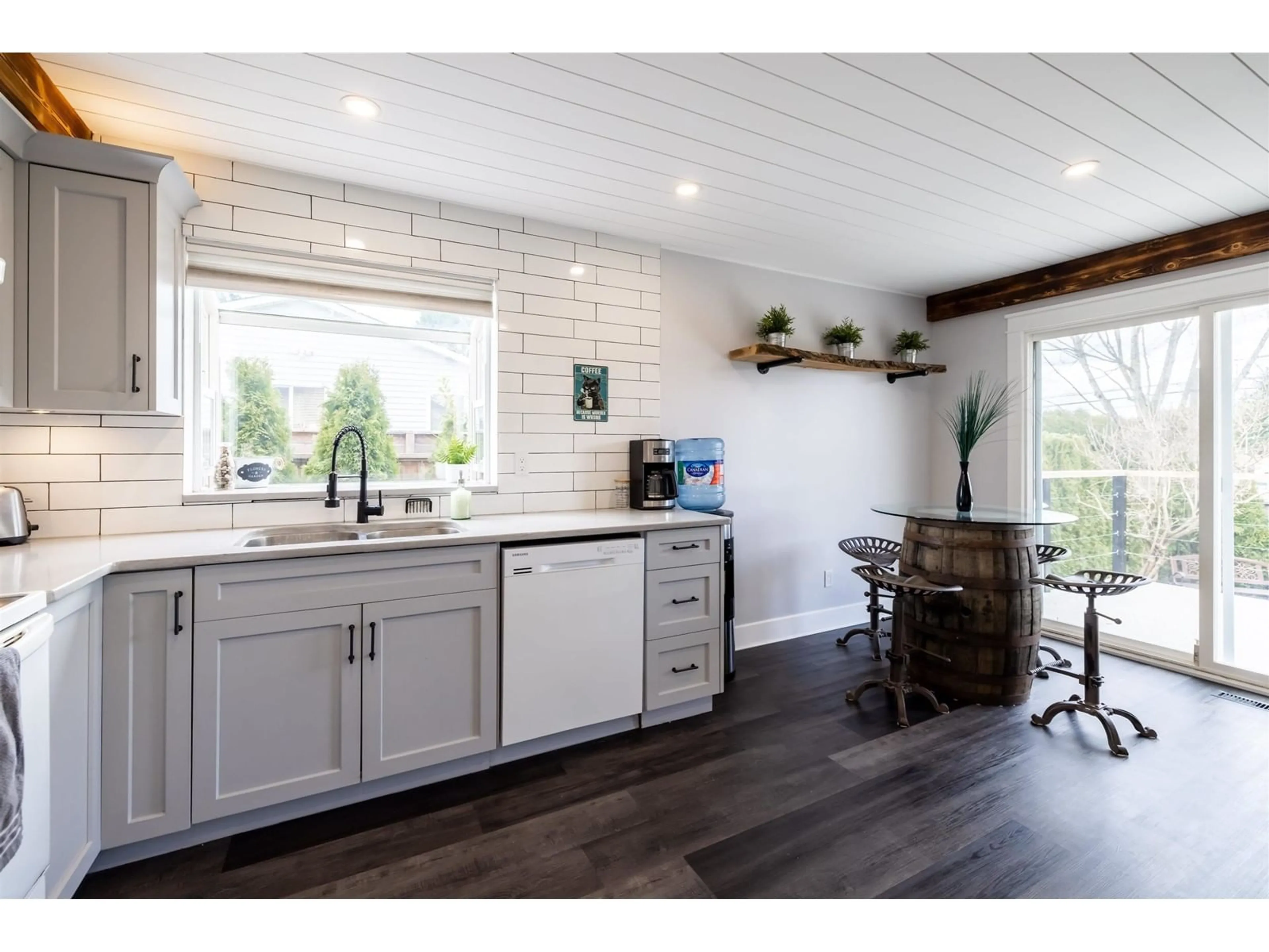 Open concept kitchen, wood/laminate floor for 26595 30A AVENUE, Langley British Columbia V4W3C8