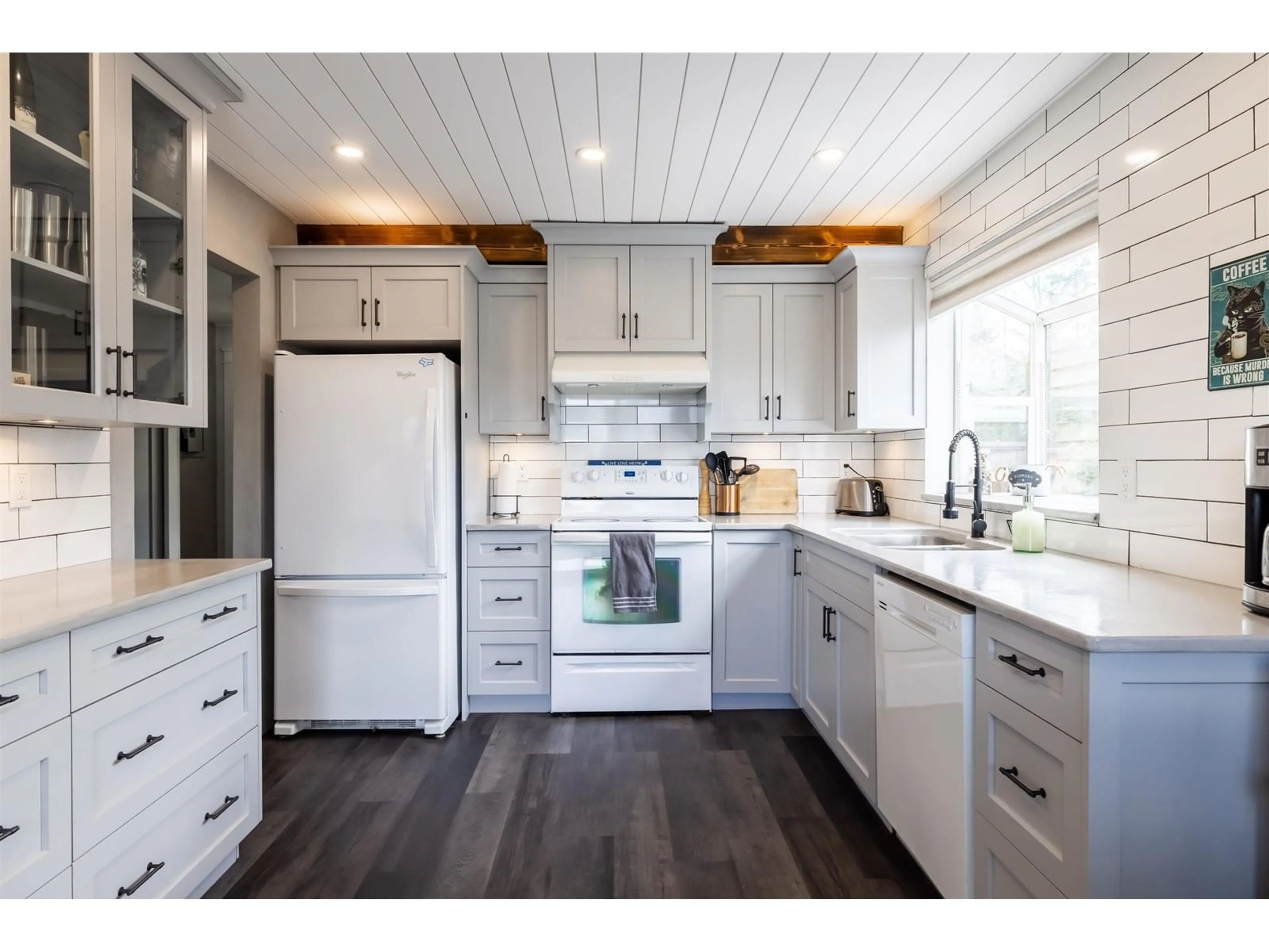 Open concept kitchen, wood/laminate floor for 26595 30A AVENUE, Langley British Columbia V4W3C8