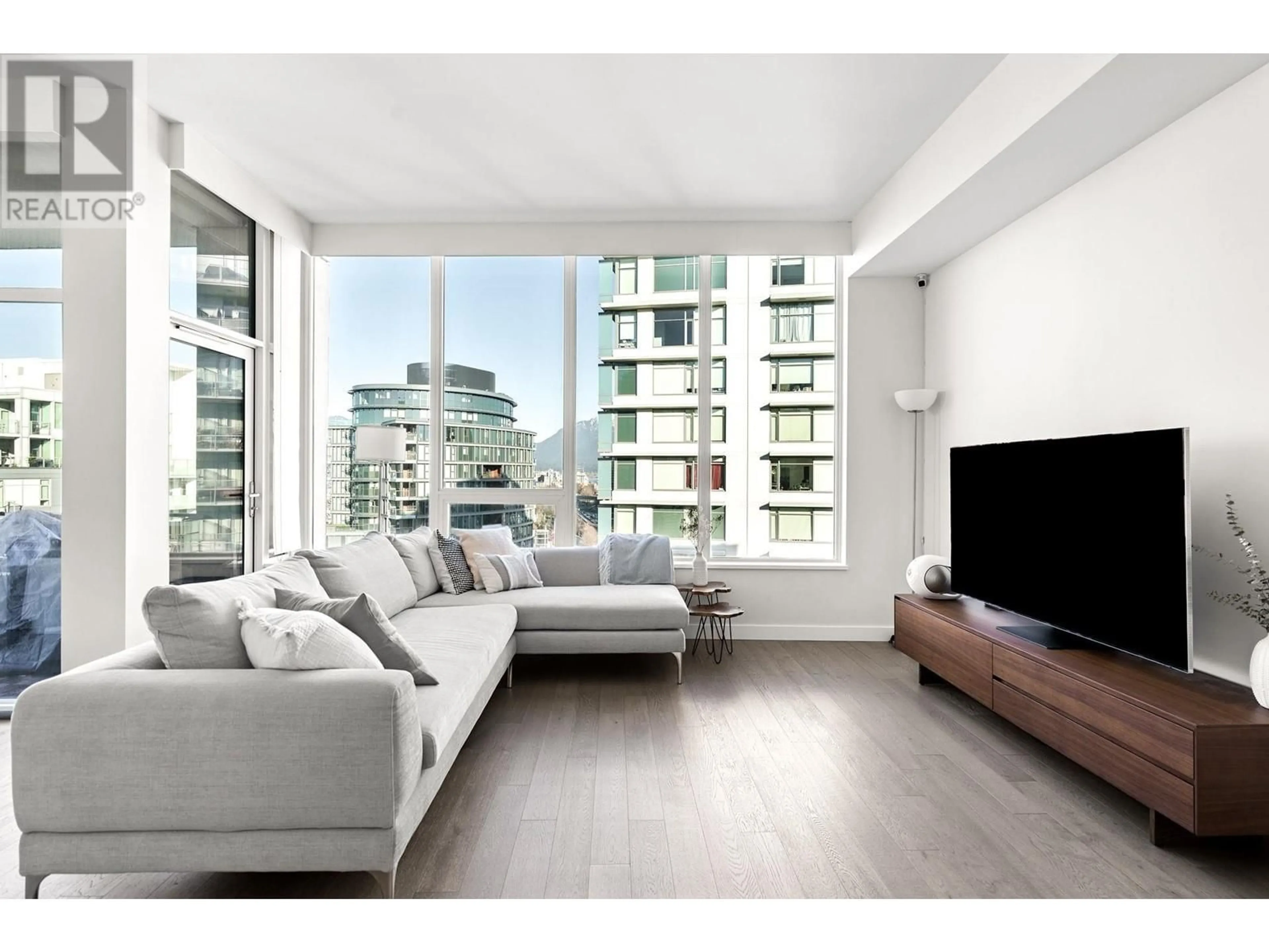 Living room with furniture, wood/laminate floor for 1706 111 E 1ST AVENUE, Vancouver British Columbia V6A0E9