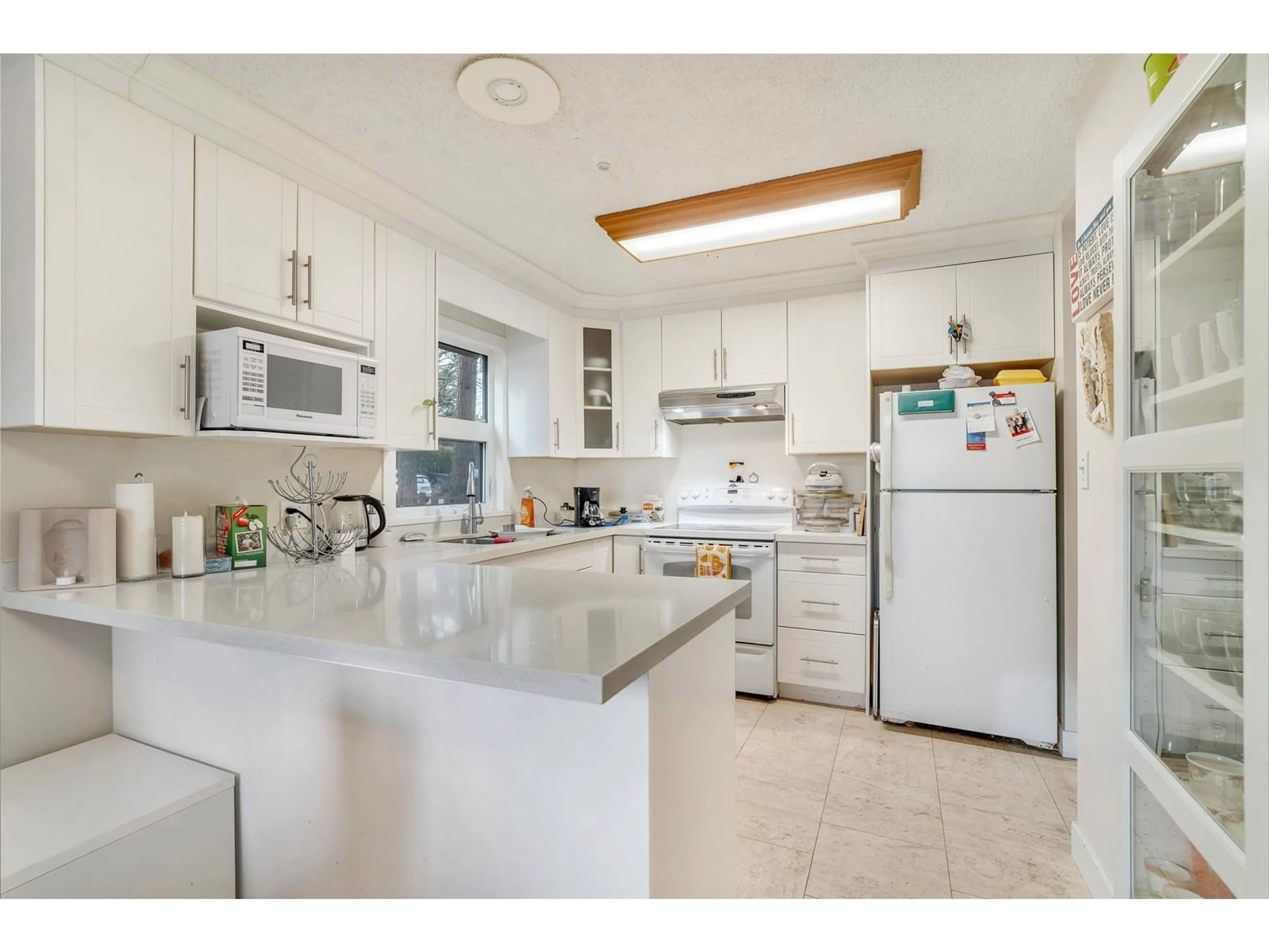 Standard kitchen, ceramic/tile floor for 13301 70B AVENUE, Surrey British Columbia V3W7Z3