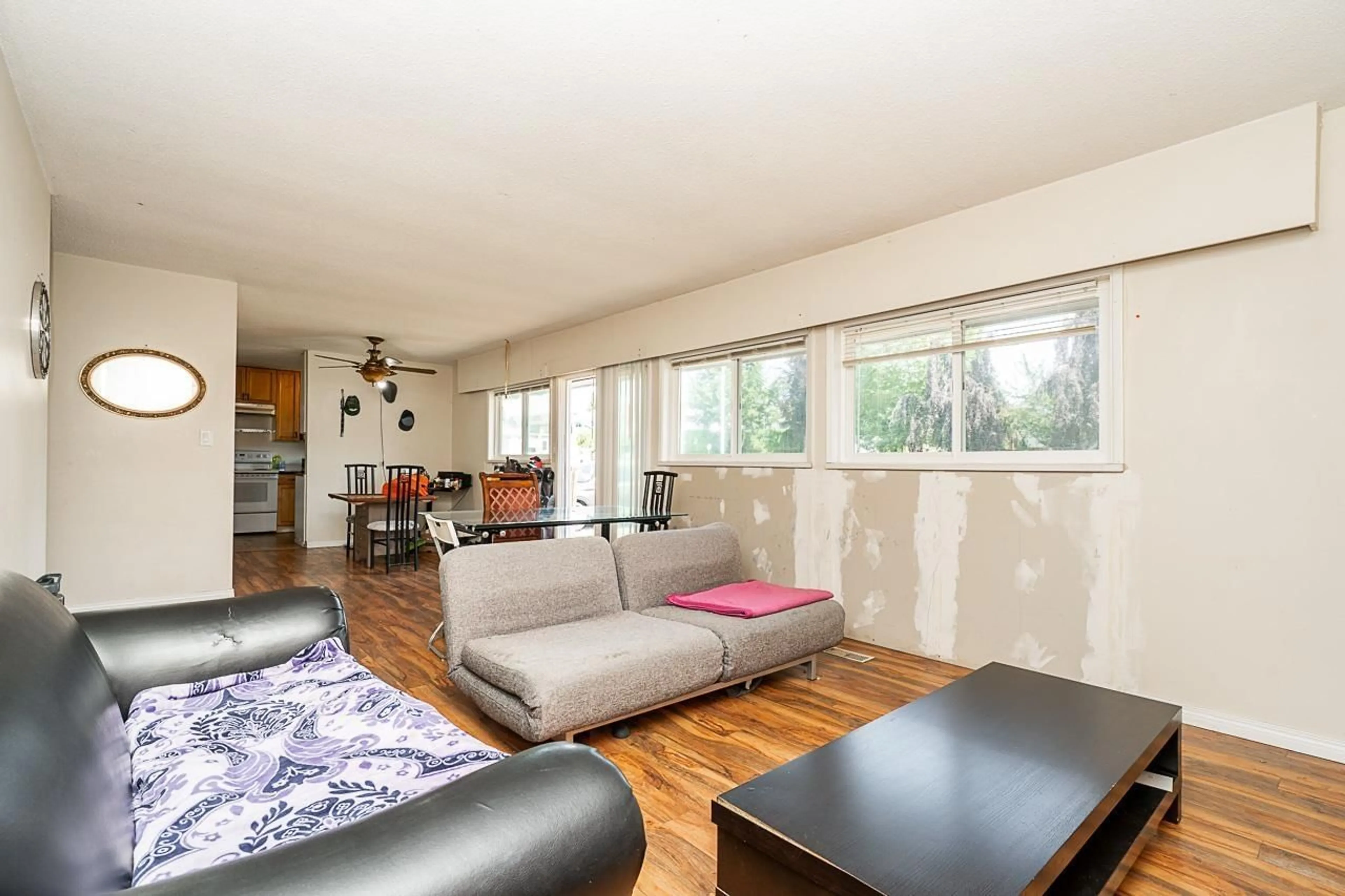 Living room with furniture, wood/laminate floor for 3227 274A STREET, Langley British Columbia V4W3J2