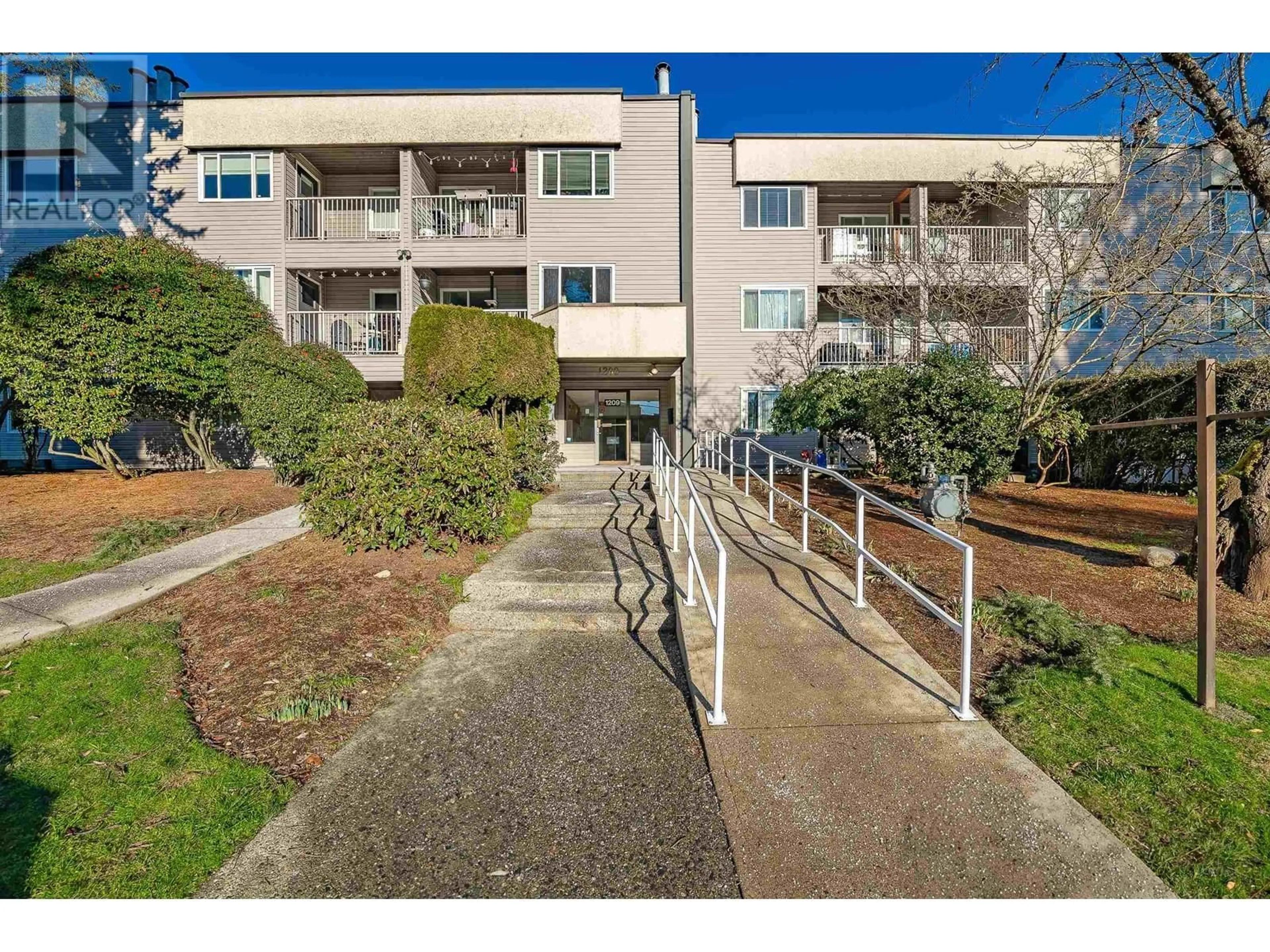 A pic from outside/outdoor area/front of a property/back of a property/a pic from drone, unknown for 101 1209 HOWIE AVENUE, Coquitlam British Columbia V3J1T9