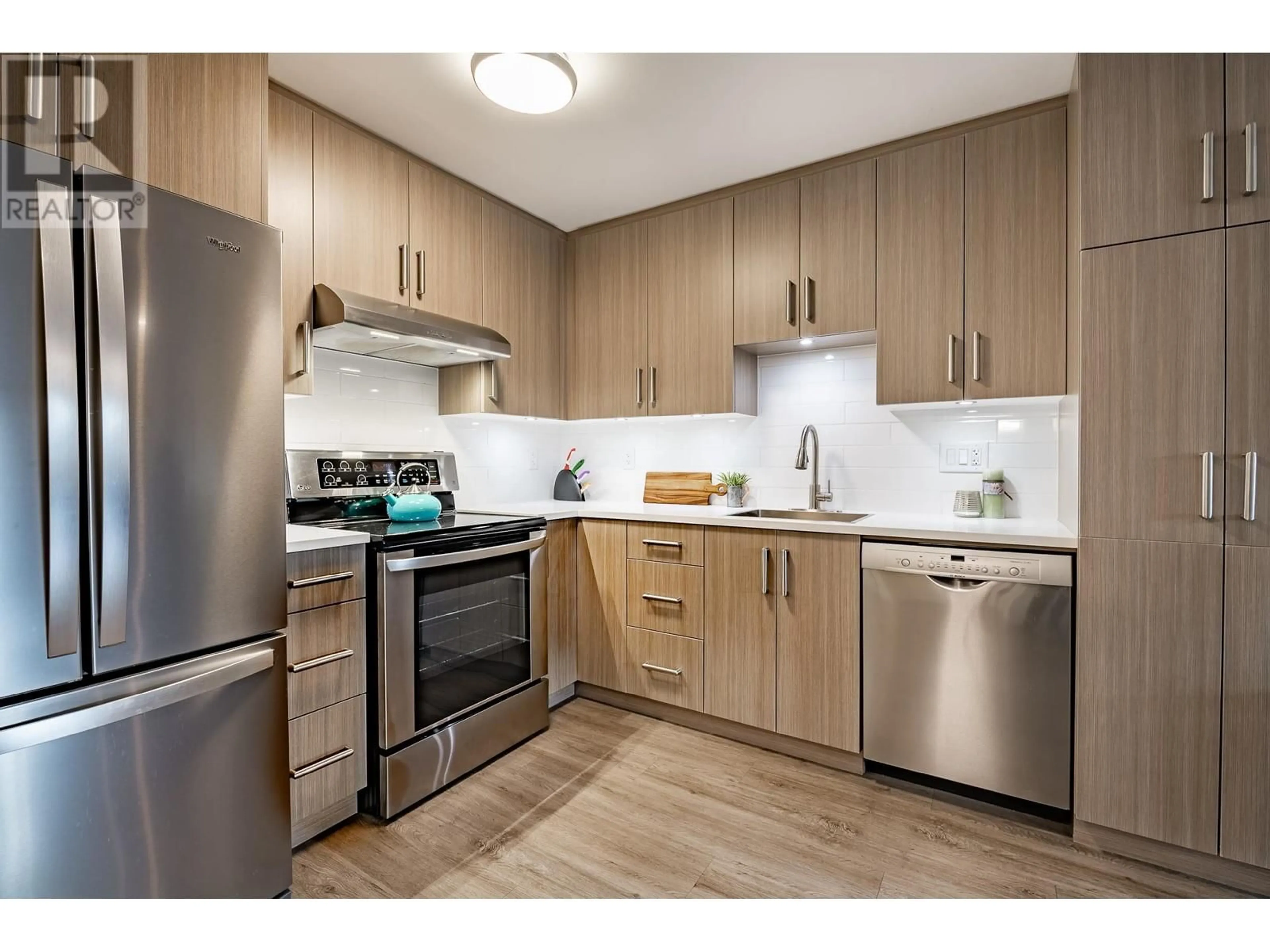 Standard kitchen, wood/laminate floor for 101 1209 HOWIE AVENUE, Coquitlam British Columbia V3J1T9