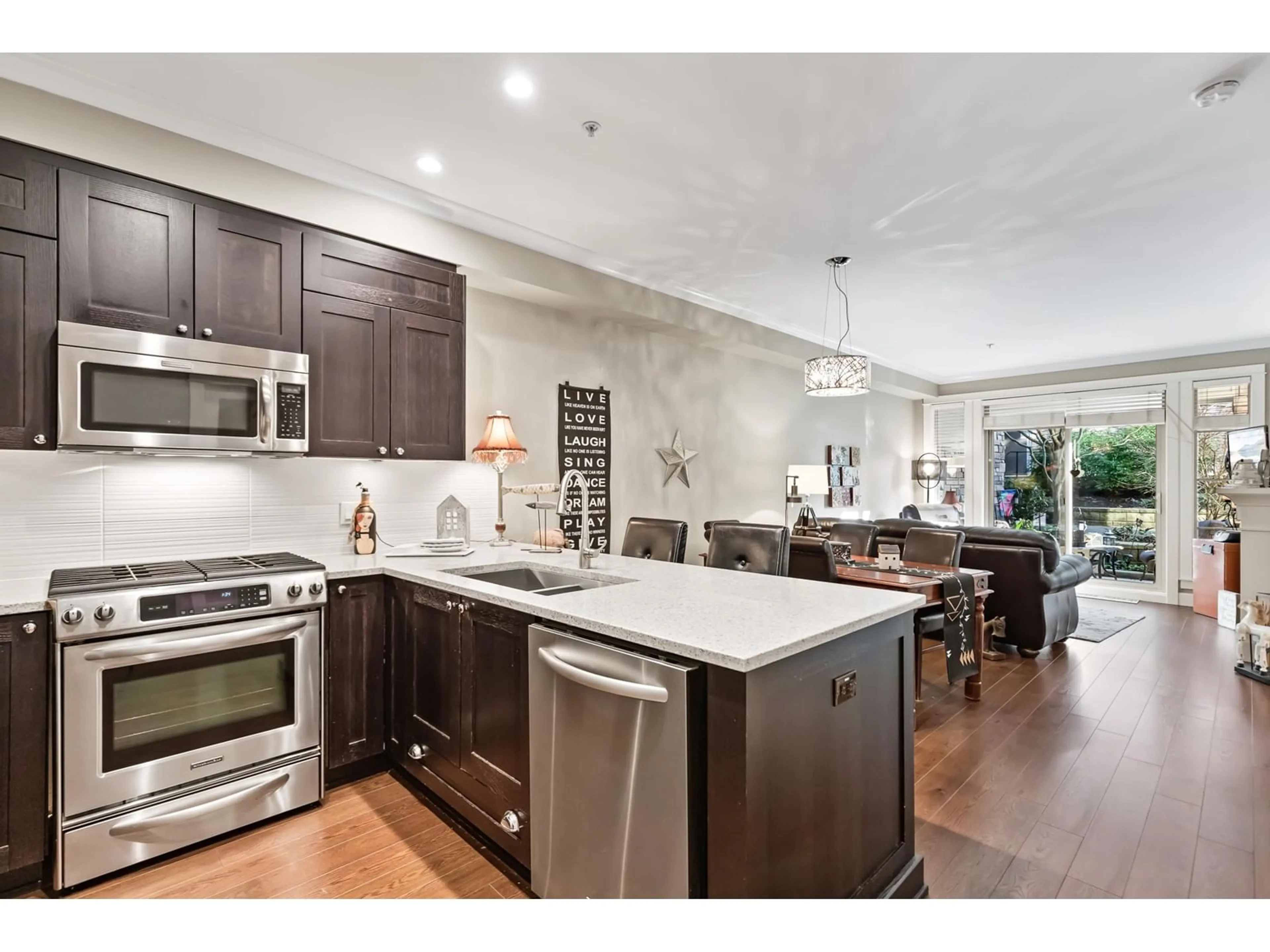 Open concept kitchen, unknown for 102 15175 36 AVENUE, Surrey British Columbia V3Z4R3