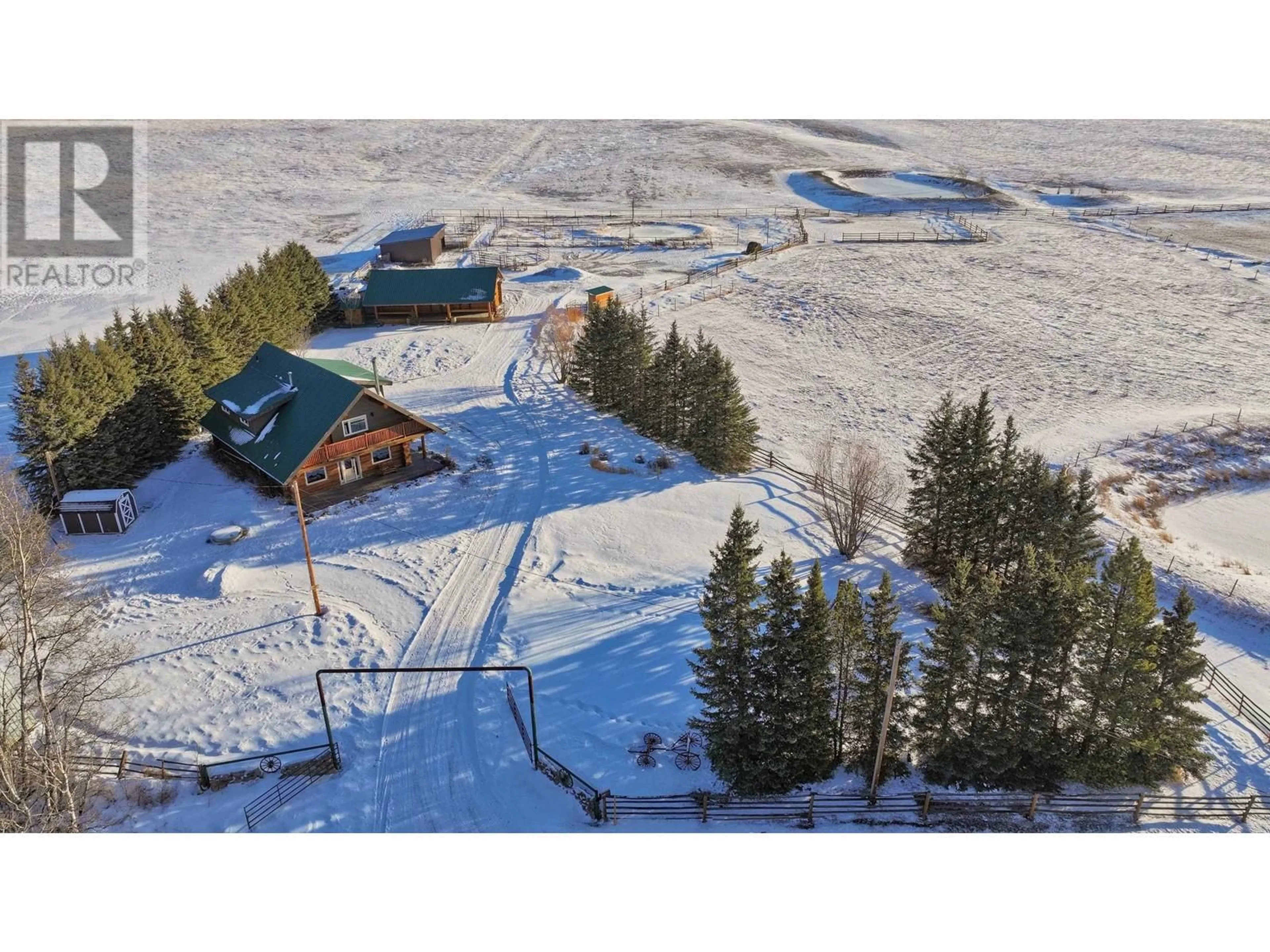 A pic from outside/outdoor area/front of a property/back of a property/a pic from drone, mountain view for 15445 BELL ROAD, Fort St. John British Columbia V0C1Y0