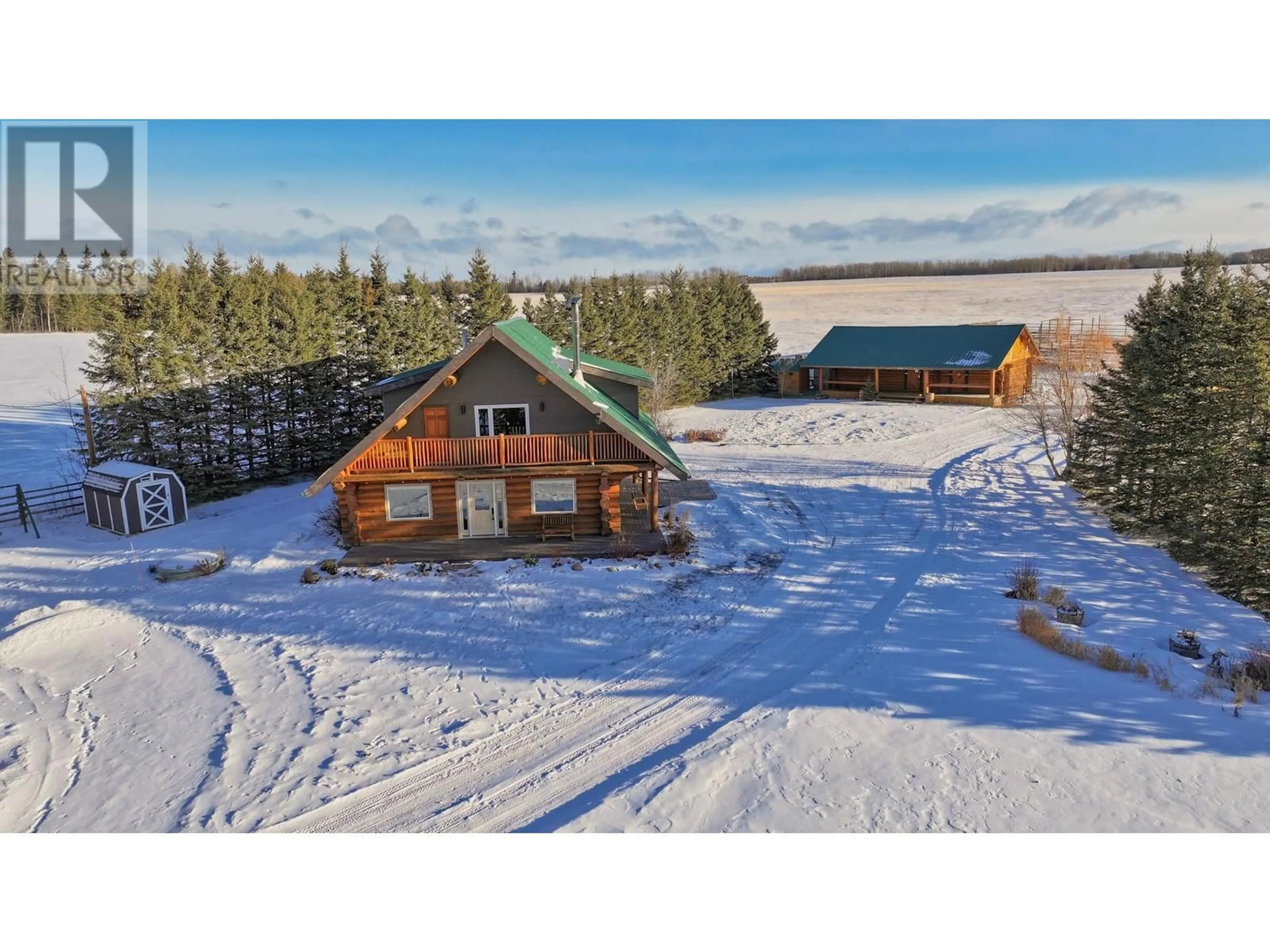 A pic from outside/outdoor area/front of a property/back of a property/a pic from drone, unknown for 15445 BELL ROAD, Fort St. John British Columbia V0C1Y0