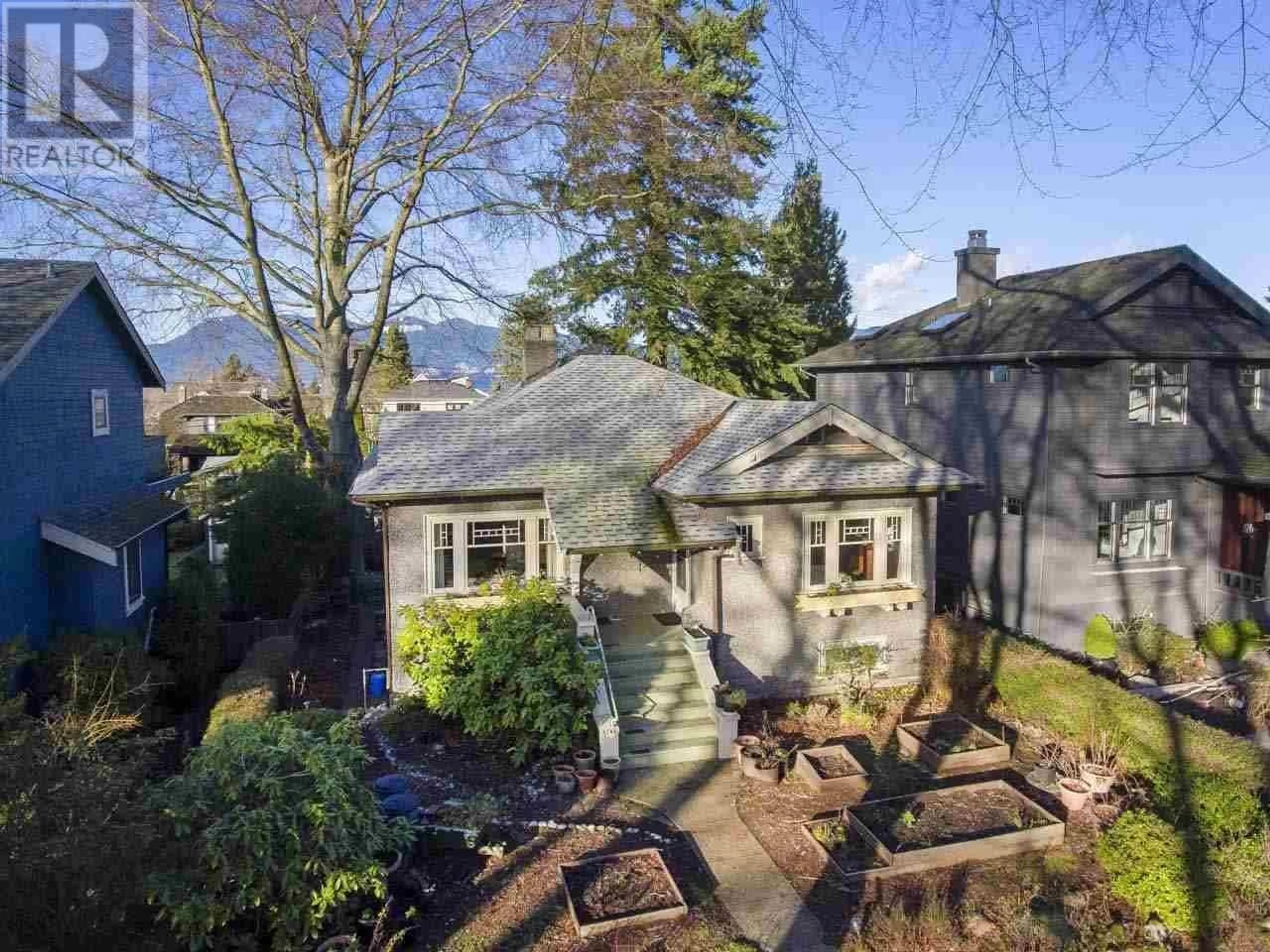 A pic from outside/outdoor area/front of a property/back of a property/a pic from drone, mountain view for 4247 W 13TH AVENUE, Vancouver British Columbia V6R2T7