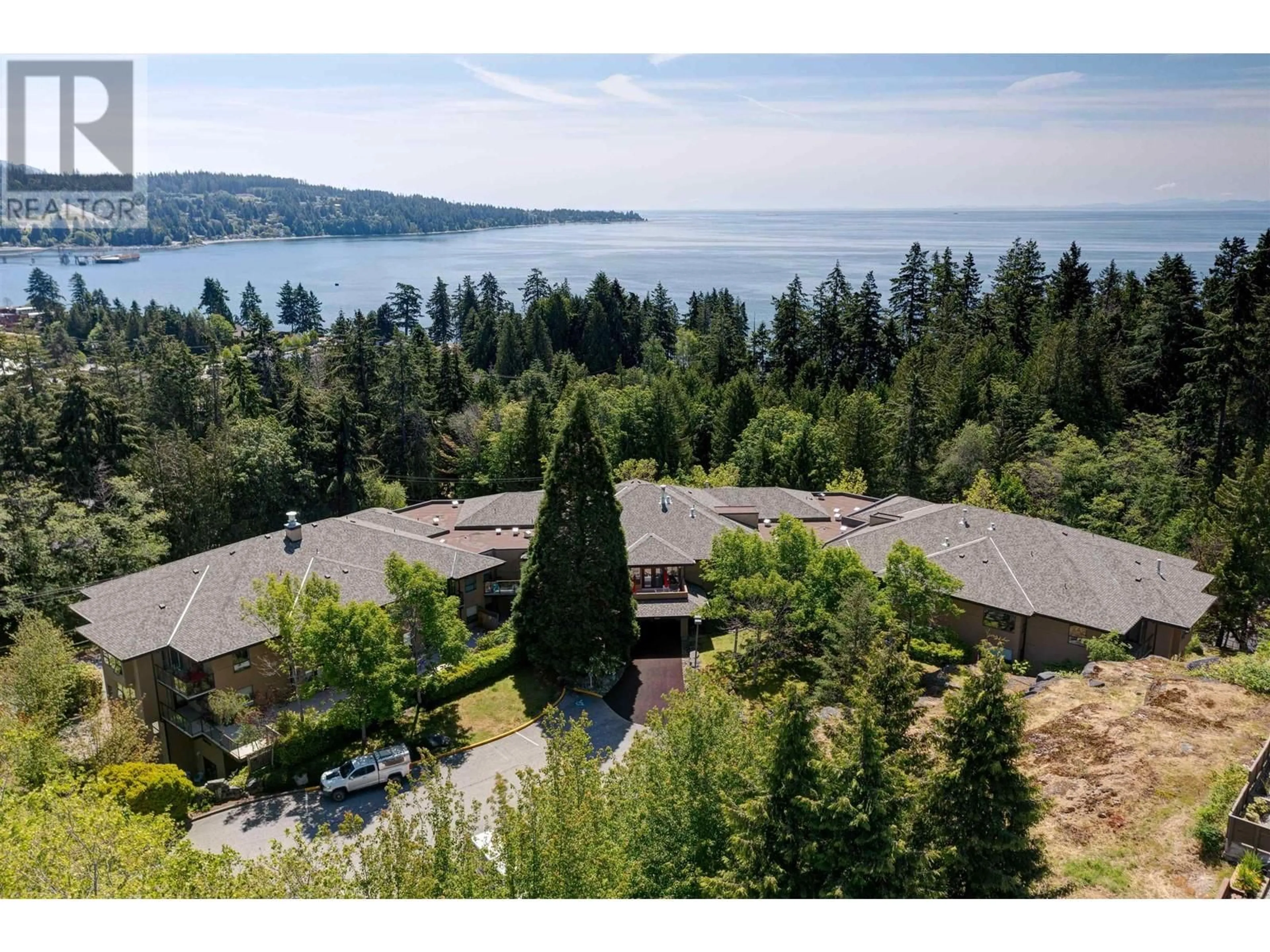 A pic from outside/outdoor area/front of a property/back of a property/a pic from drone, water/lake/river/ocean view for 414 5855 COWRIE STREET, Sechelt British Columbia V7Z0K1