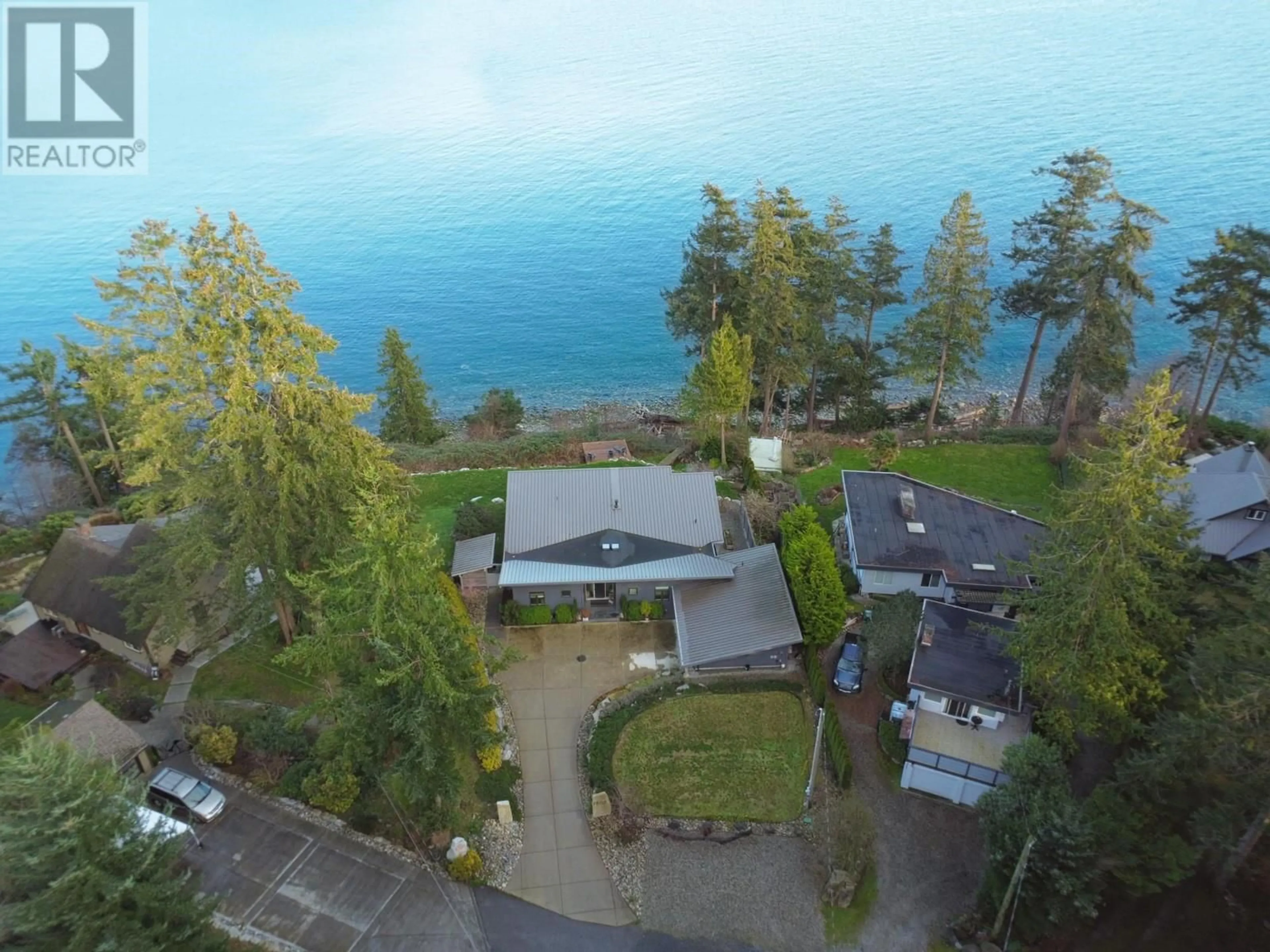 A pic from outside/outdoor area/front of a property/back of a property/a pic from drone, water/lake/river/ocean view for 7503 EUREKA PLACE, Halfmoon Bay British Columbia V7Z1A1