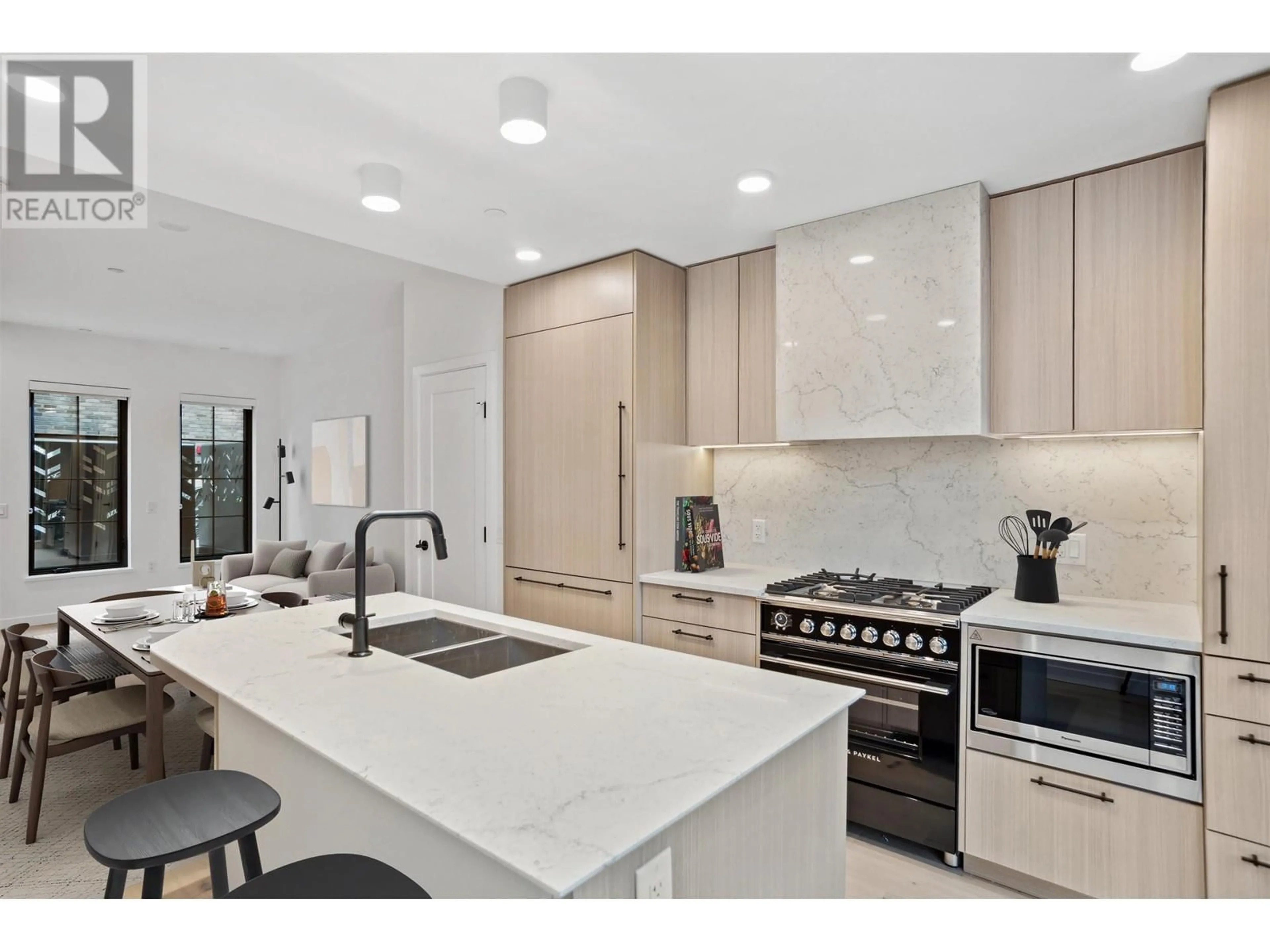 Contemporary kitchen, ceramic/tile floor for 197 KING EDWARD AVE STREET, Vancouver British Columbia V5Y4B4