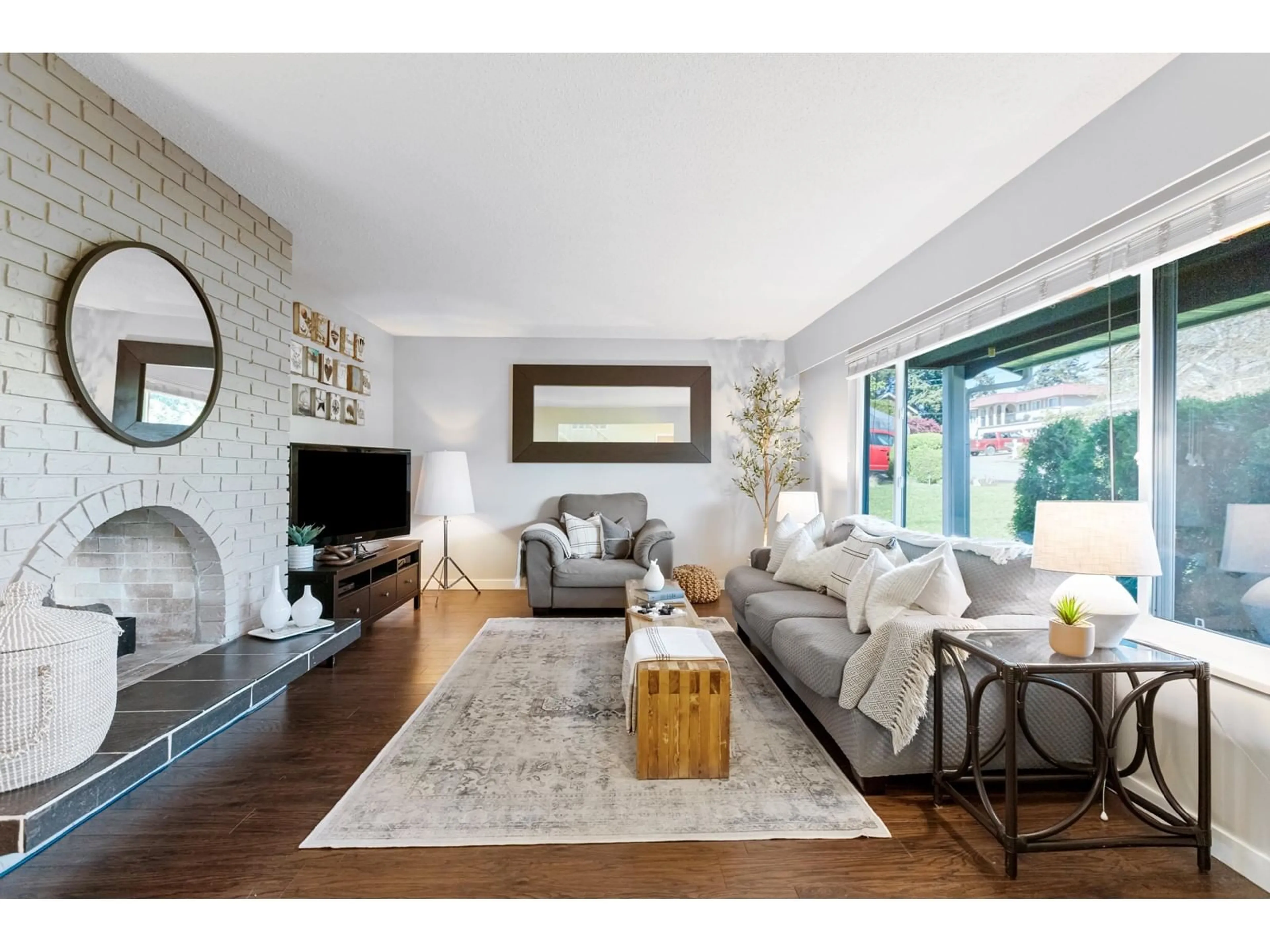 Living room with furniture, wood/laminate floor for 7507 W MINSTER DRIVE, Delta British Columbia V4C4L8